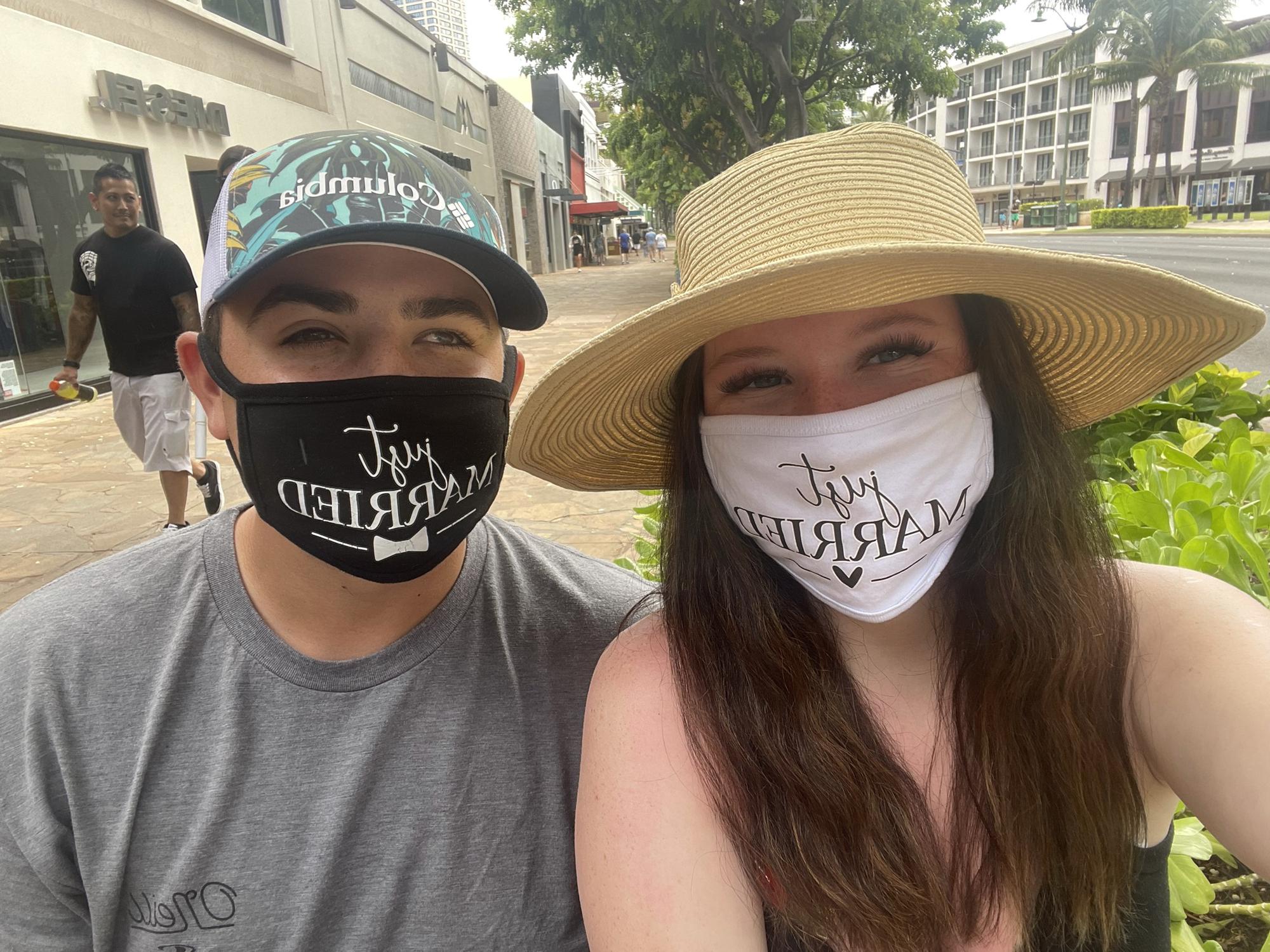 Maya and Dustin in Honolulu, Hawaii after getting married in Makaha, Hawaii 2021