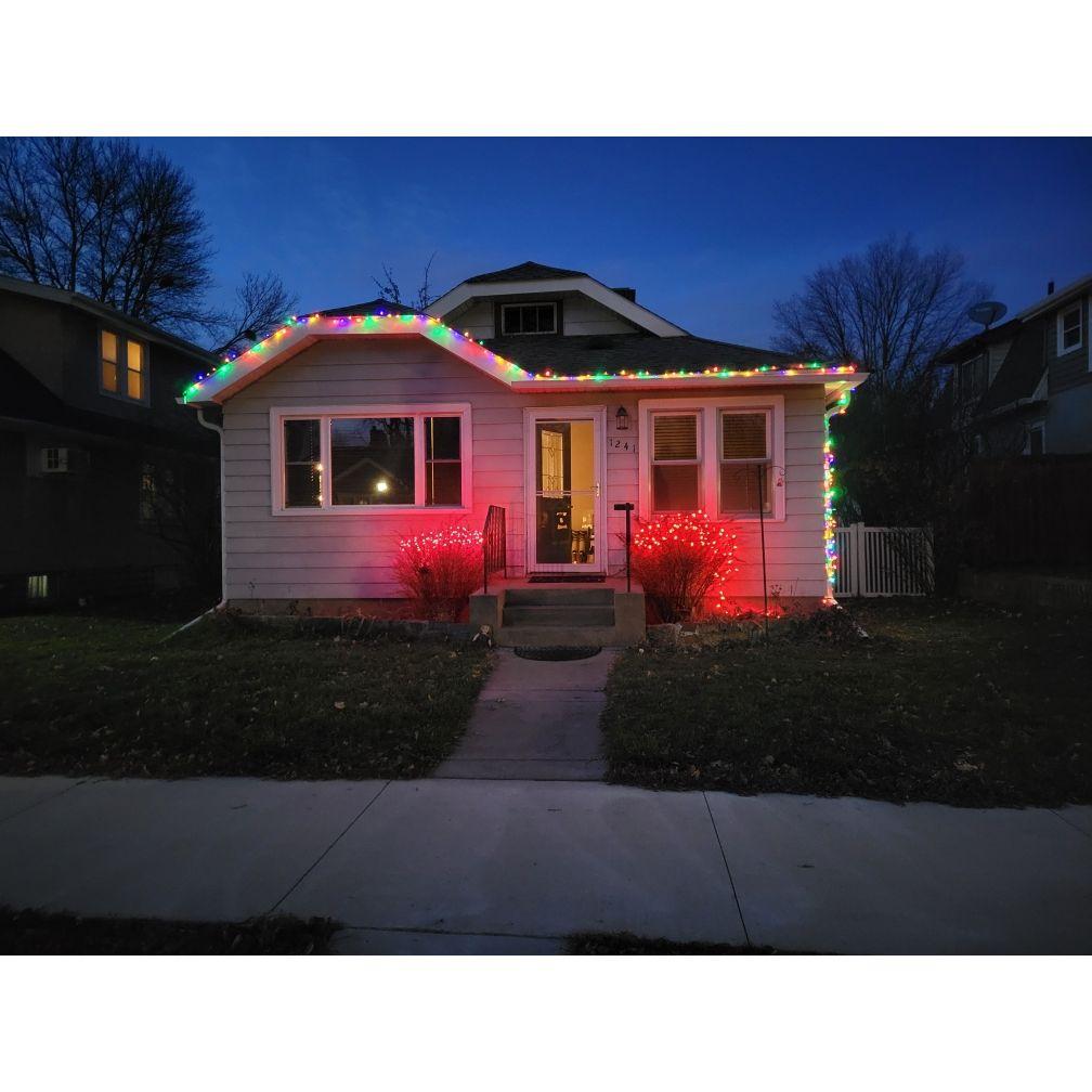 November 2023: Evan hung Christmas lights on our small house in Saint Paul