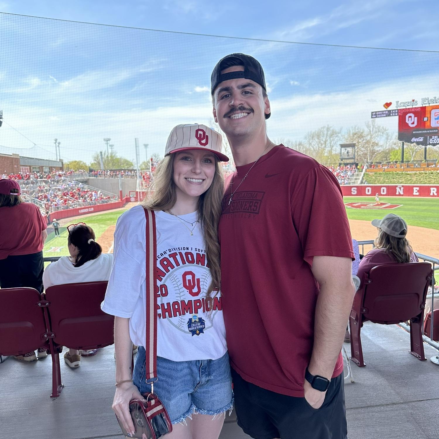 Aubrey’s first home OU softball game…Clay learned how easily Aubrey gets sunburned…
