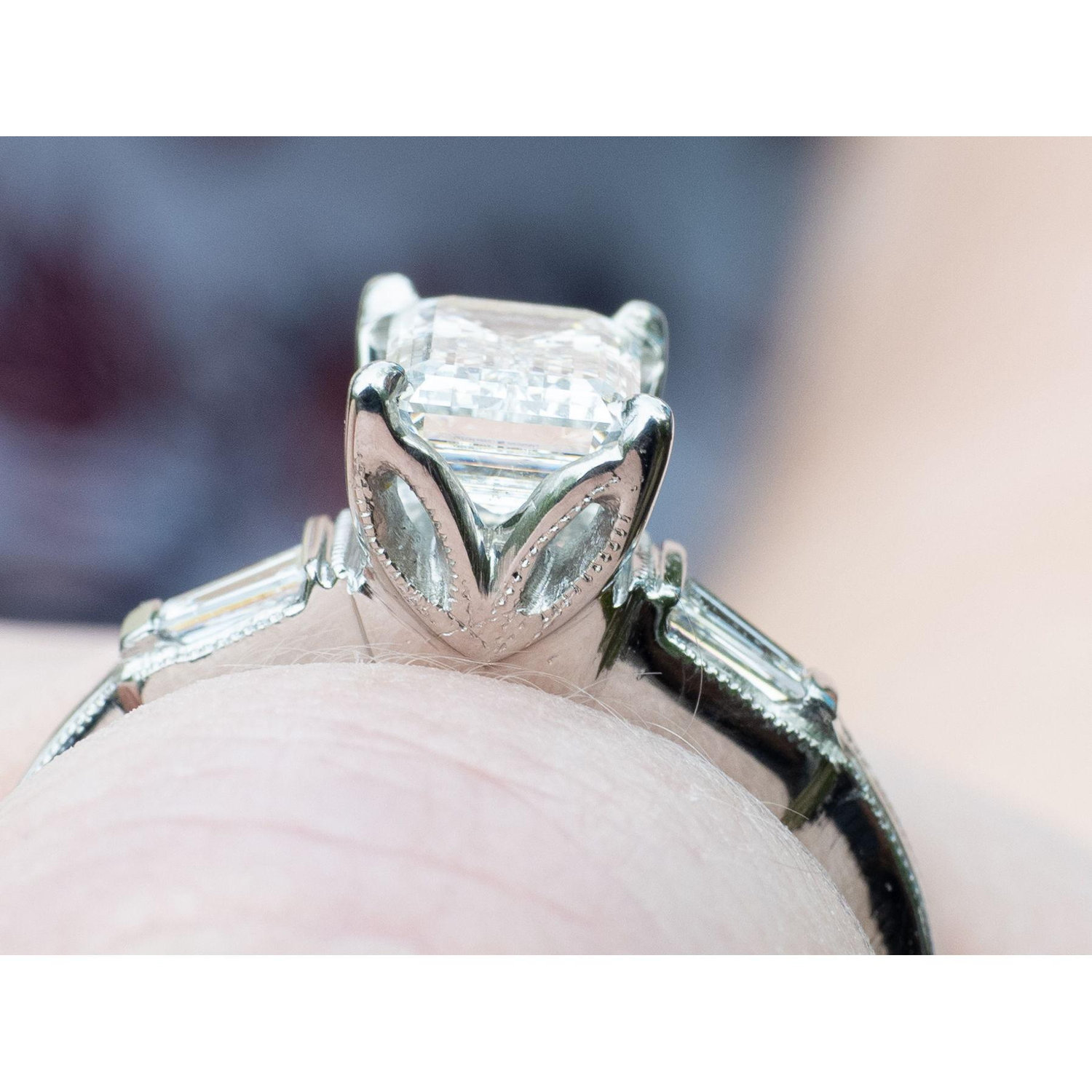 Amanda's engagement ring setting gives homage to her love of owls.