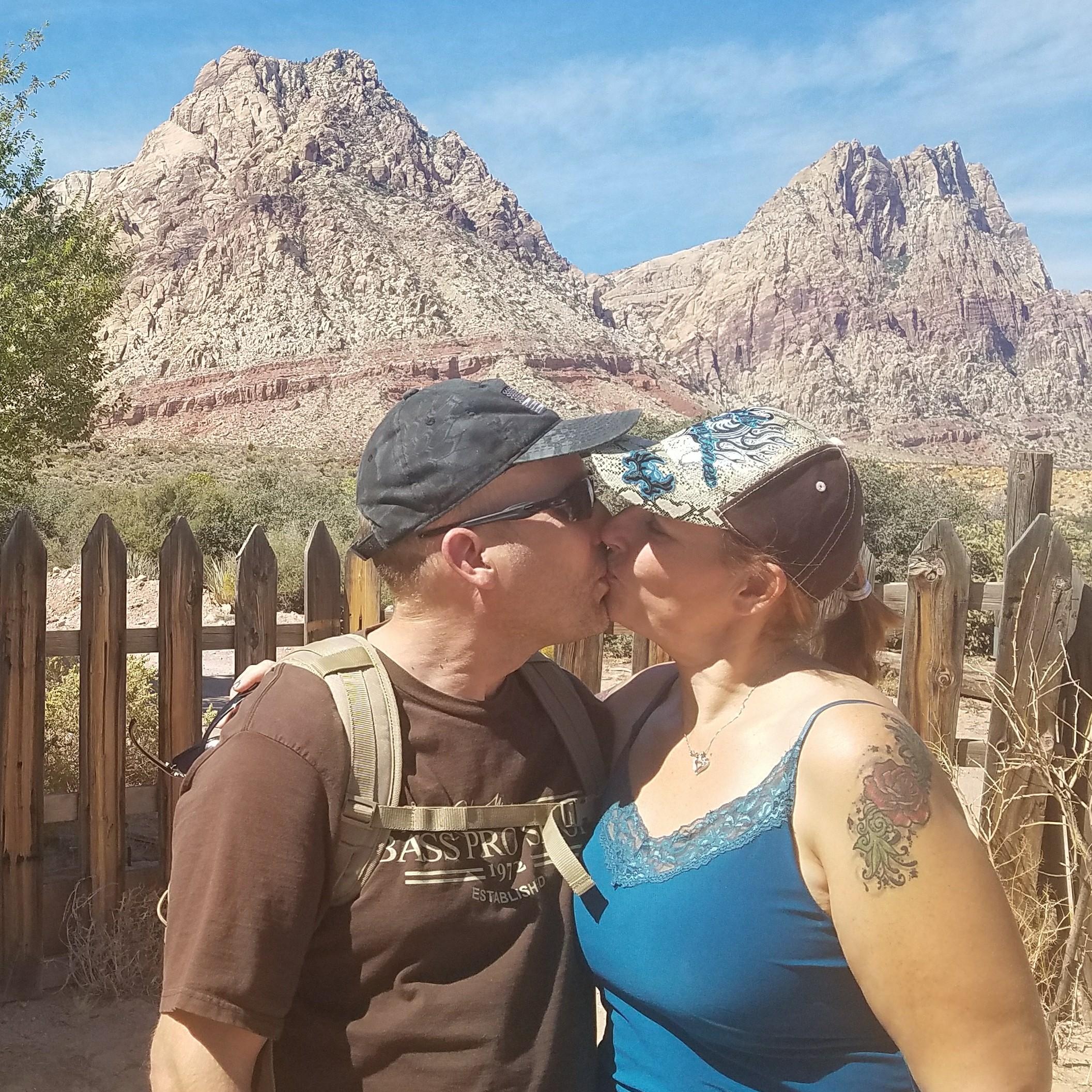 At Bonnie Springs, Old town Nevada. Behind the church were these mountains that we had to get a picture of. Kevin took the pictures so we had quite a few poses. I'm glad we both Love the Desert
