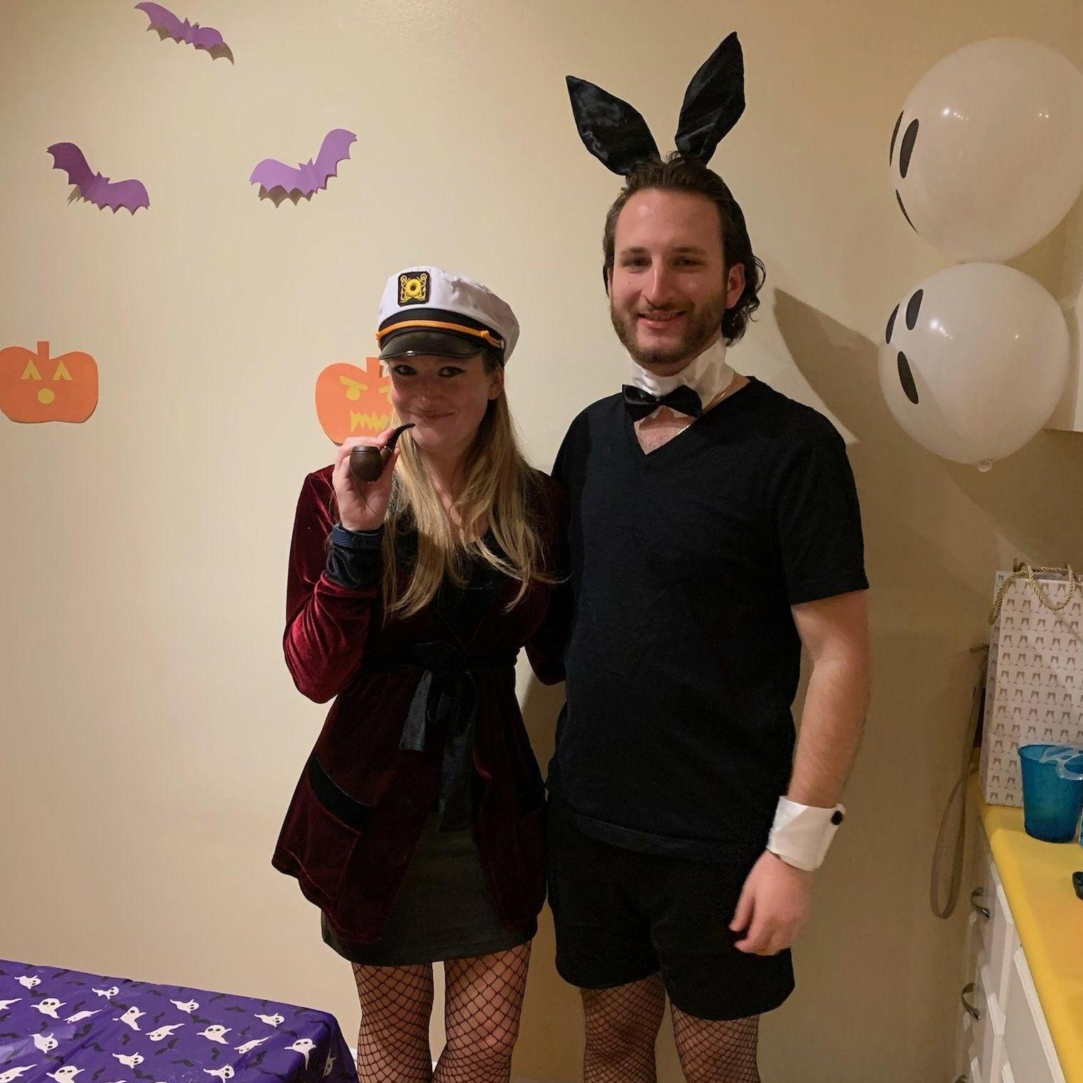 Halloween 2021 as Hugh Hefner and a playboy bunny.