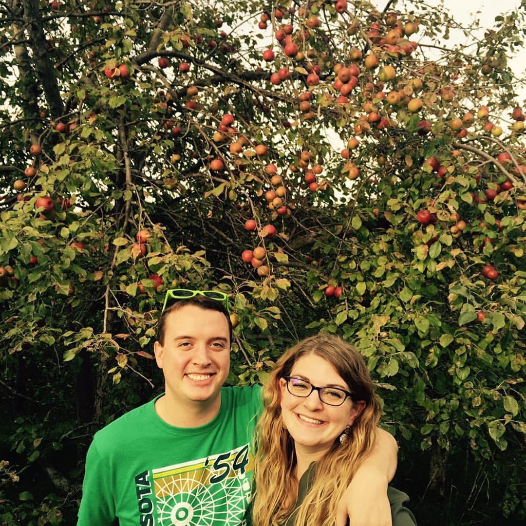 Early in our relationship. We love everything outdoors! Nothing more Minnesotan than apple orchards in the fall.