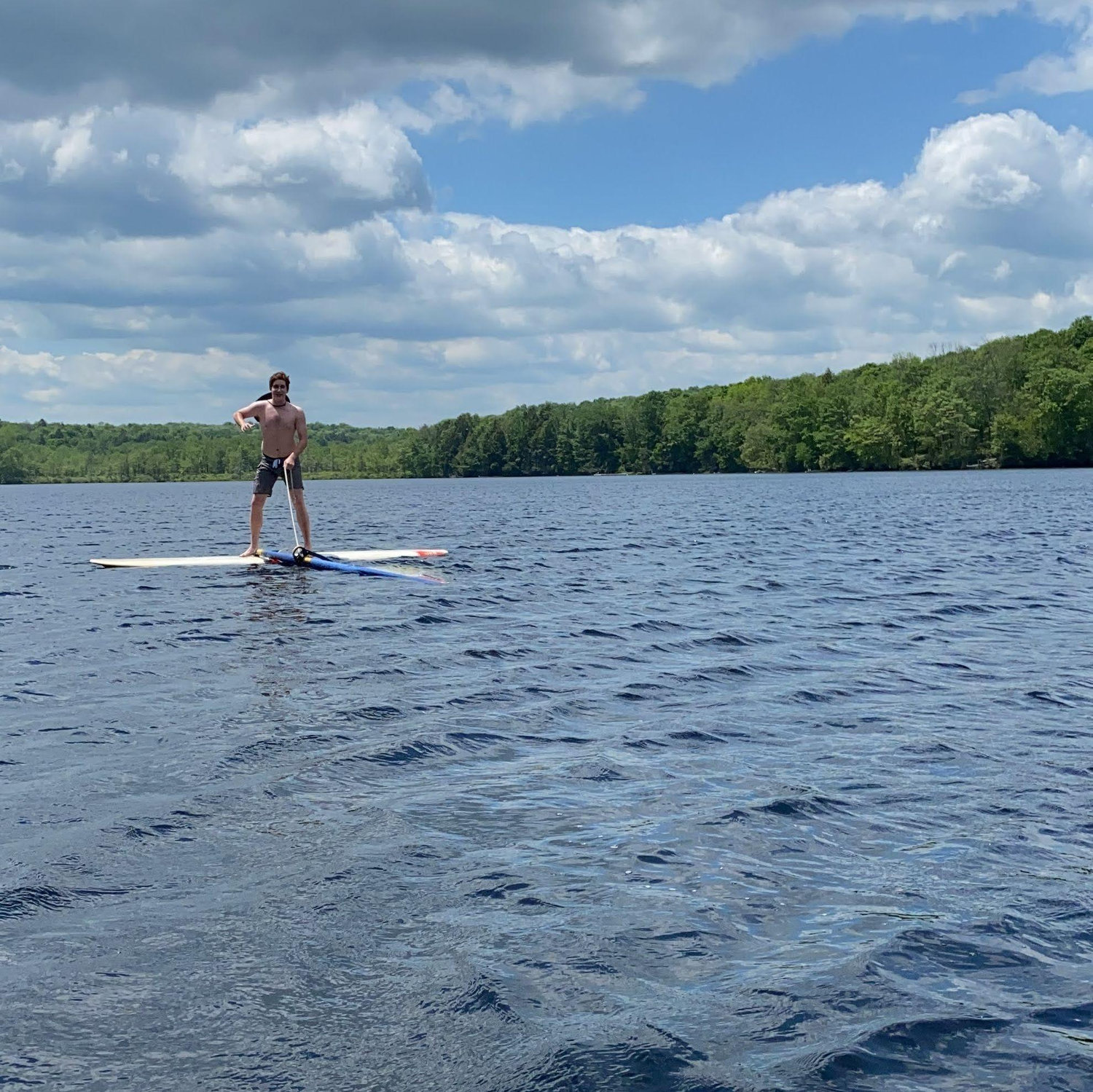 Ben's first trip to the lake, Katie was trying to teach him to windsurf