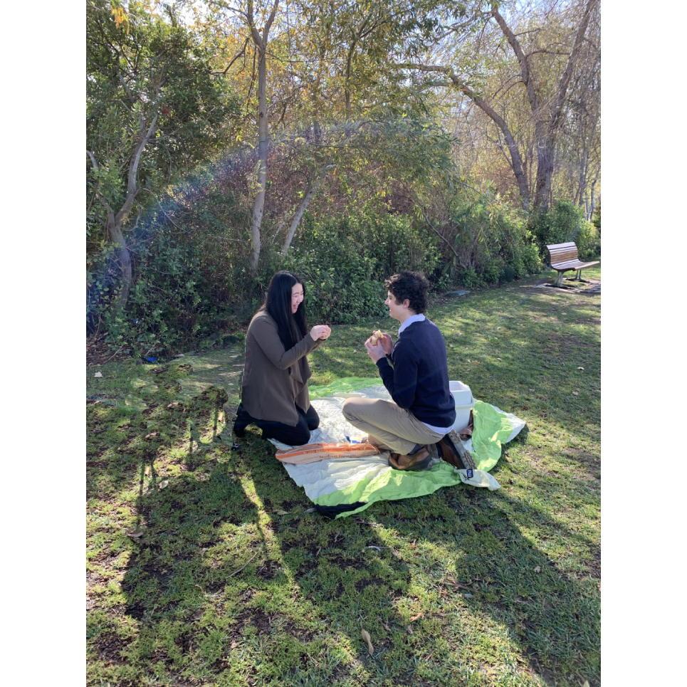 Danny's proposal on a knee is followed by Betty's surprise proposal soon afterward. A rainbow blessed this photo with its presence!