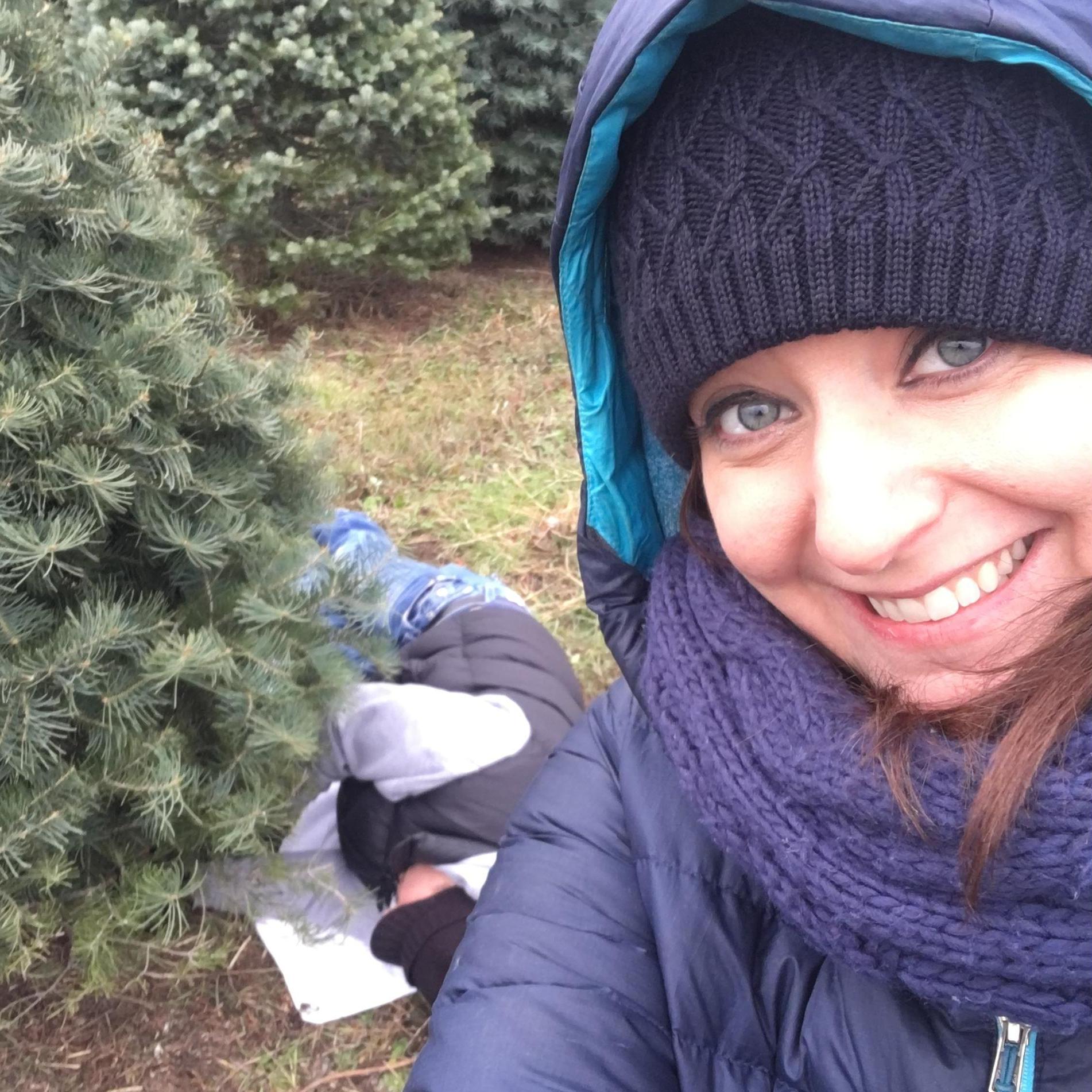 Making him do all the work getting our perfect tree cut down.