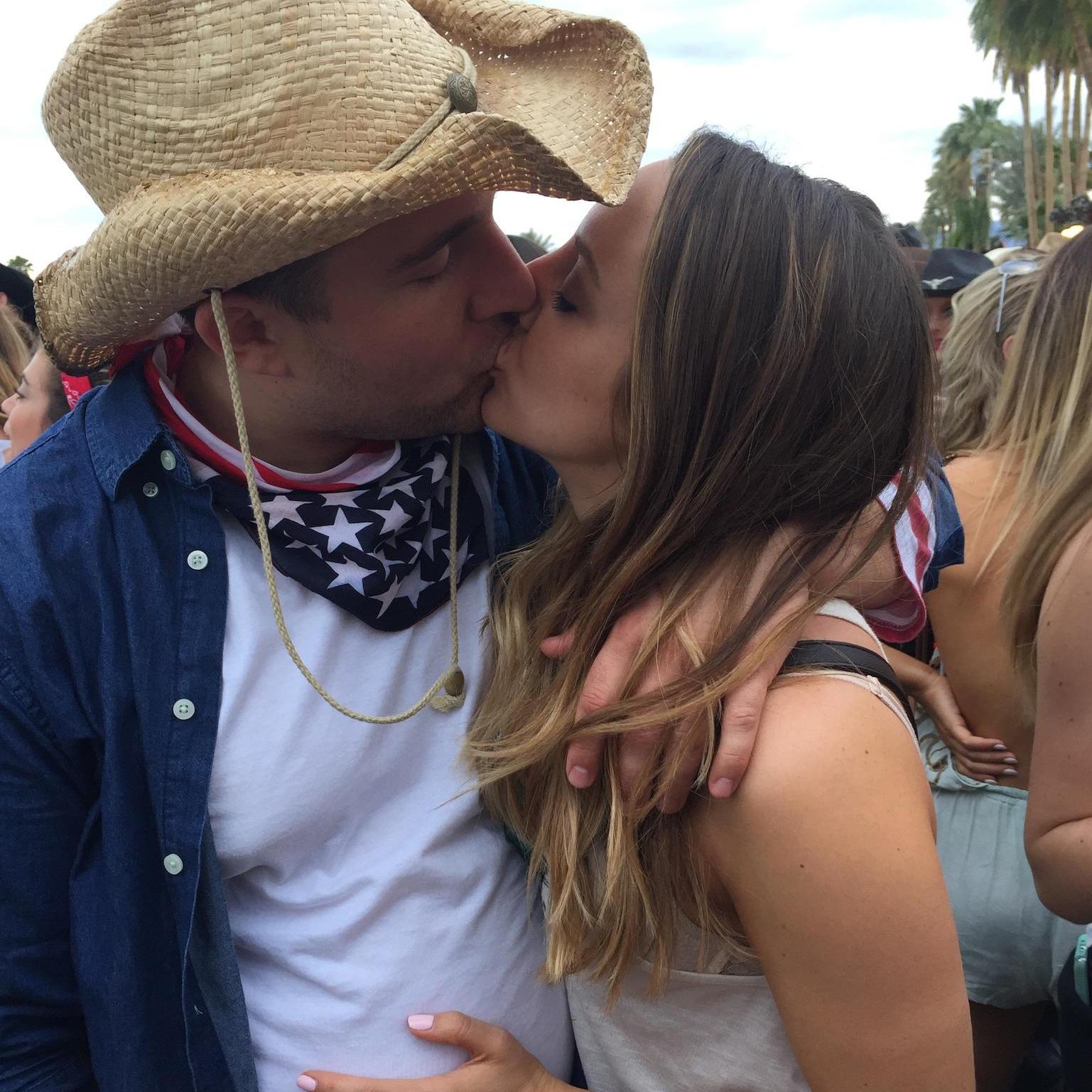 Whitney forced Dan to go to a lot of Country Concerts, now he loves them.