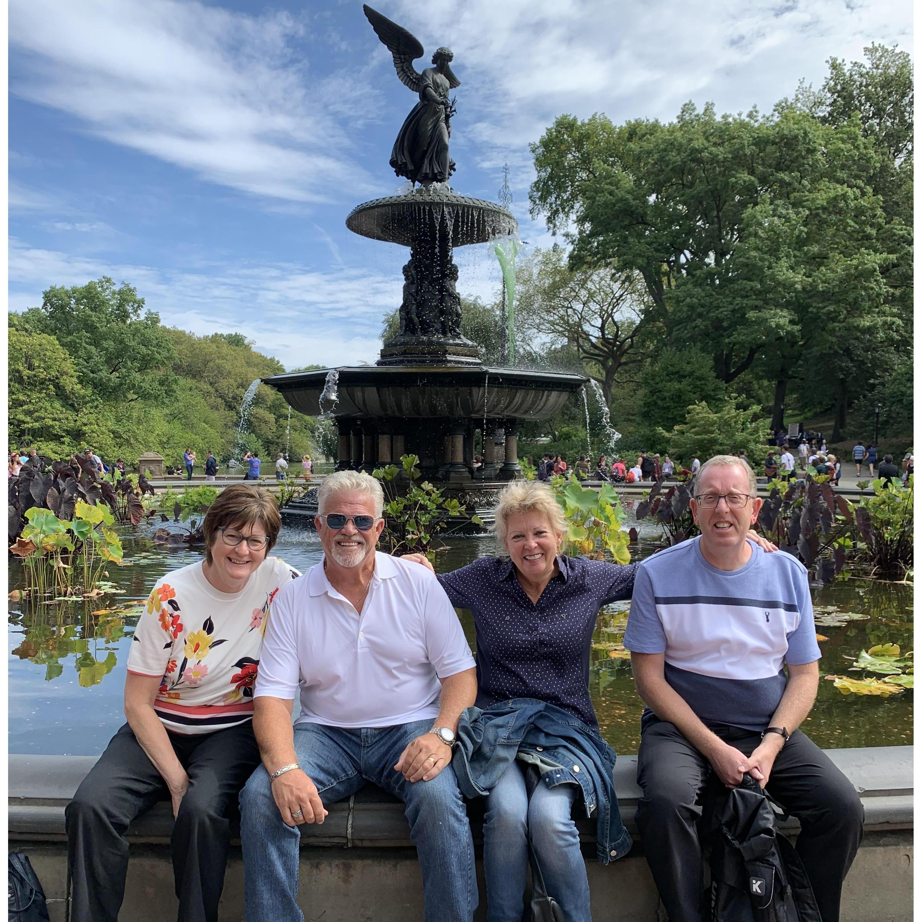 Jen and Dan's parents exploring New York City's Central Park together.