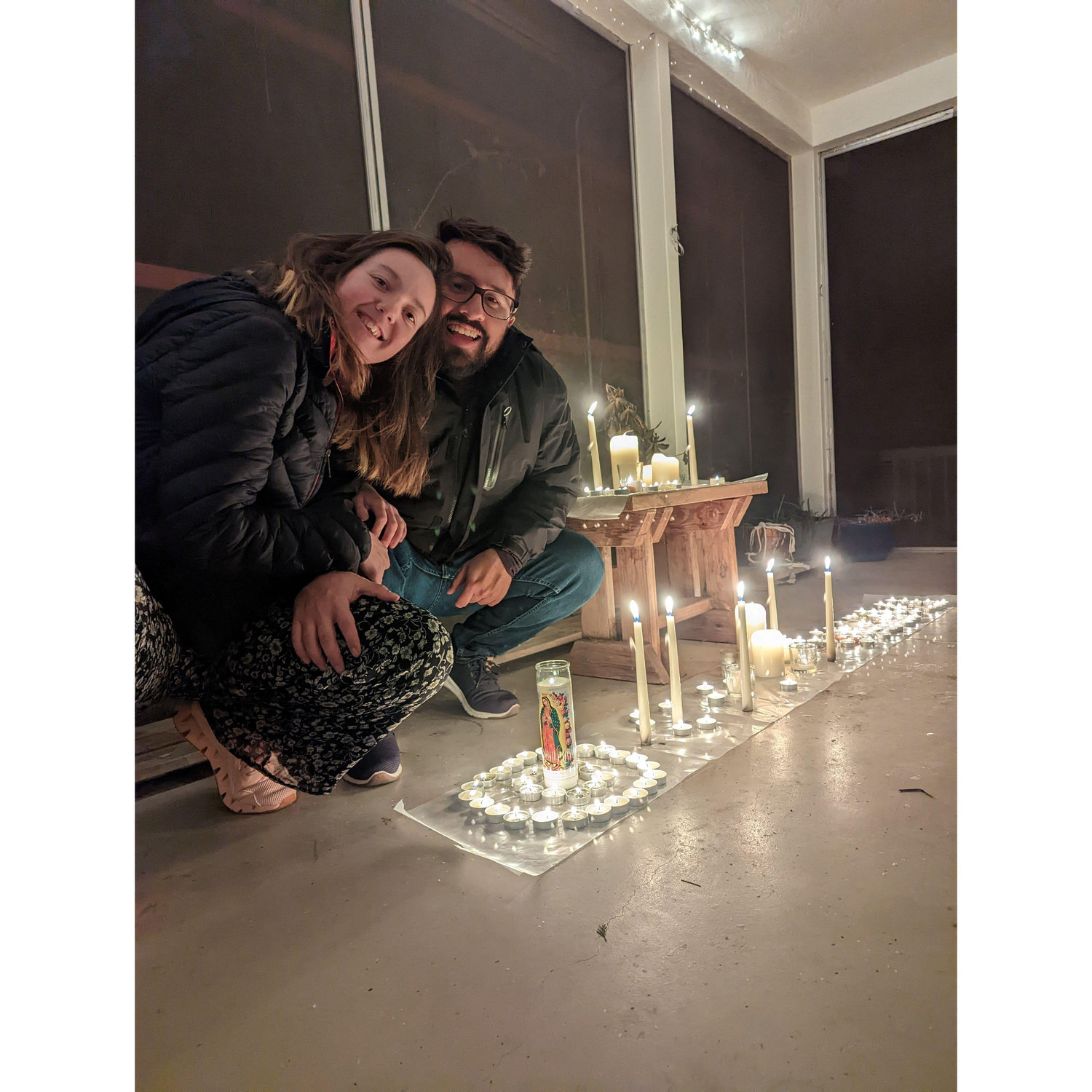 Growing up in different parts of the world, Sarah and Felipe love getting to experience the traditions of the other's culture. Here we're celebrating Día de las Velitas.