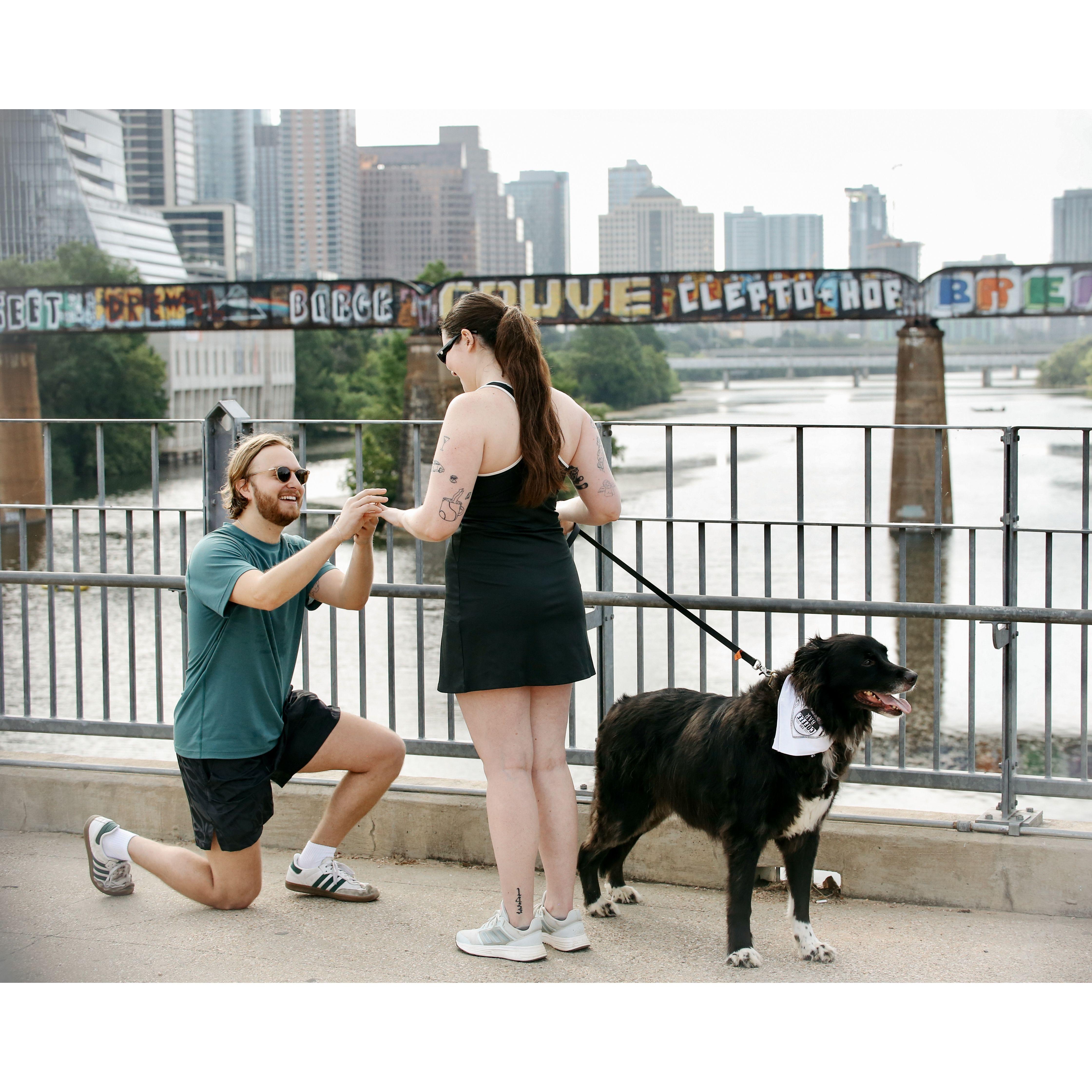 engagement on the pedestrian bridge downtown