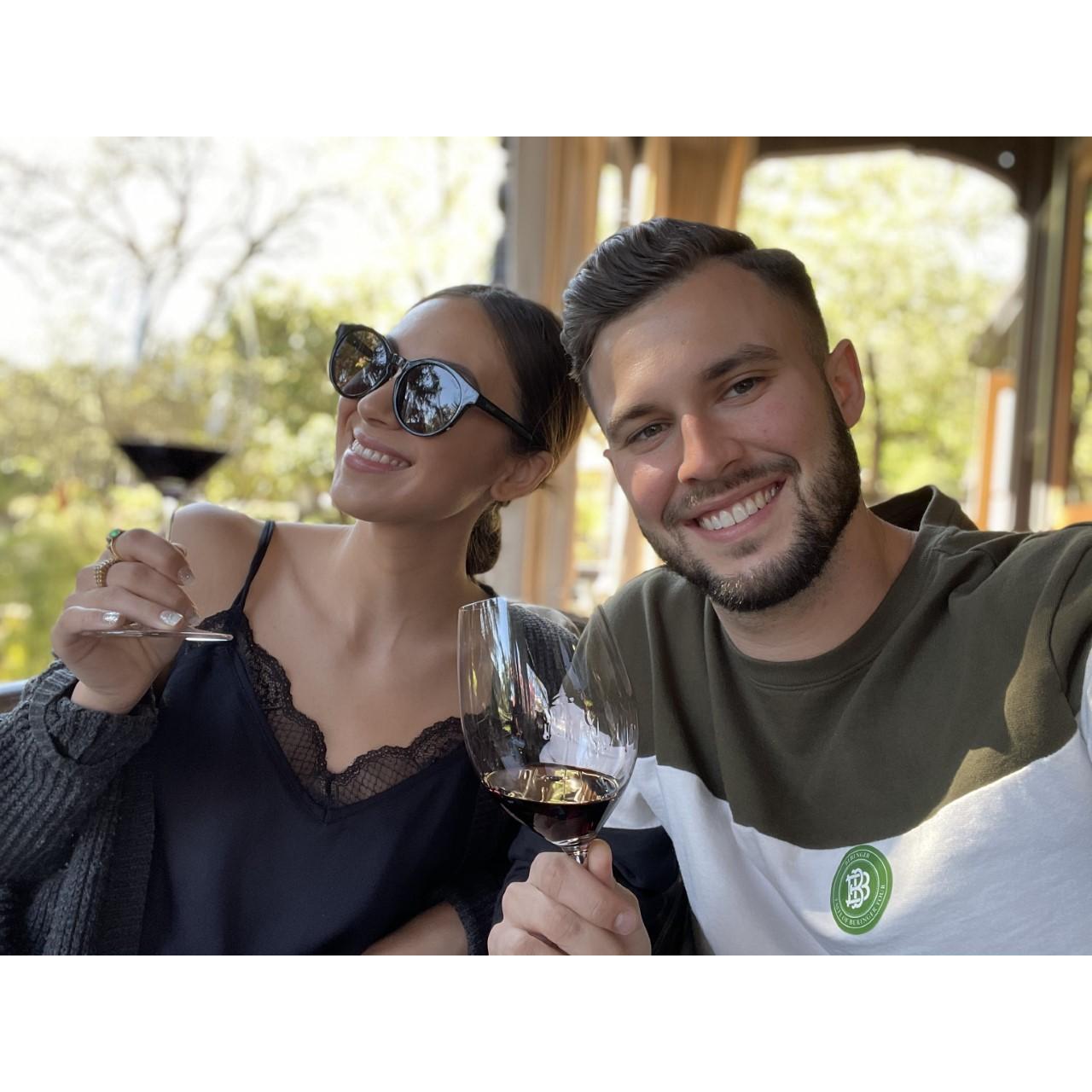 Us enjoying our new hobby- wine tasting!