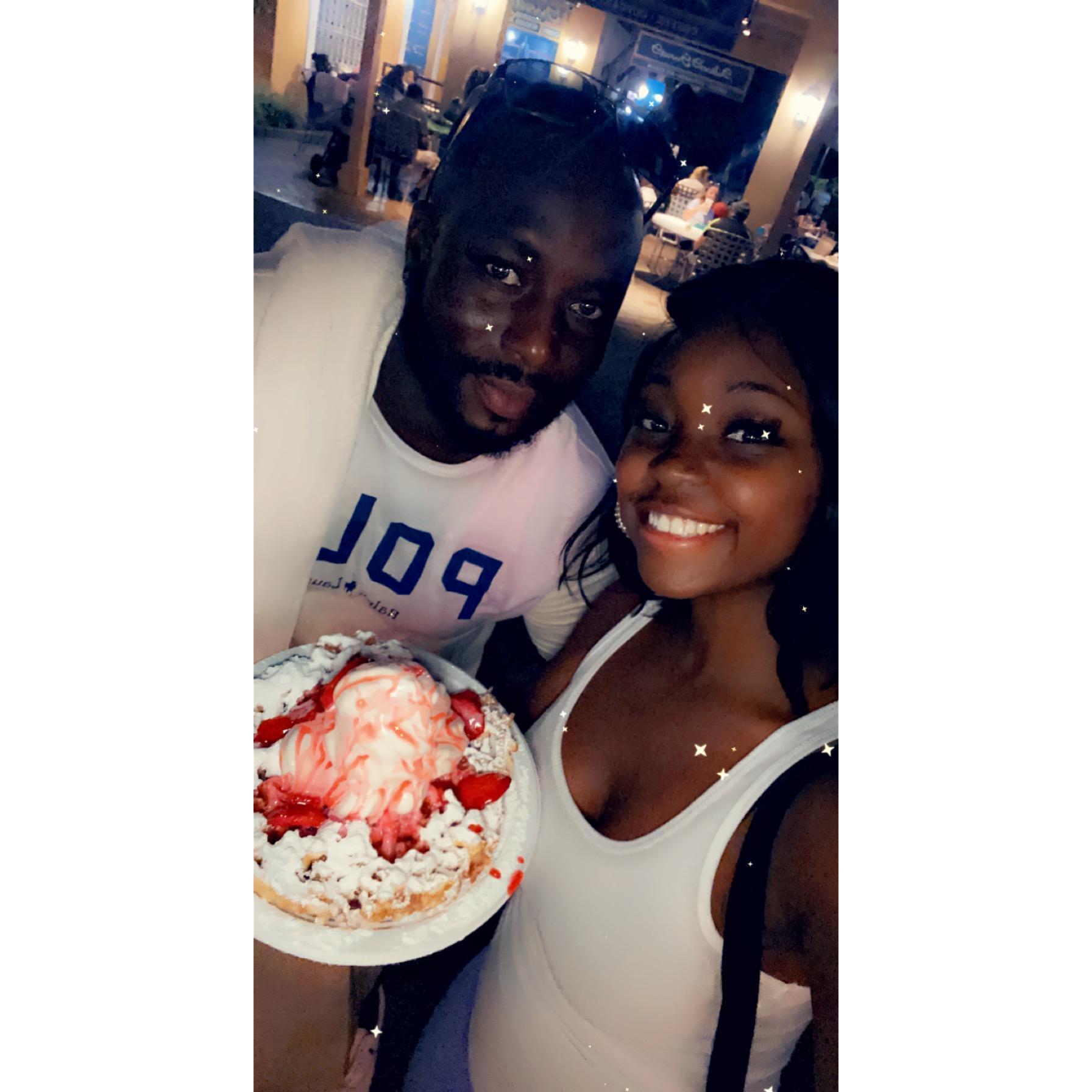 Enjoying our favorite dessert, funnel cakes, in Tampa, Florida.