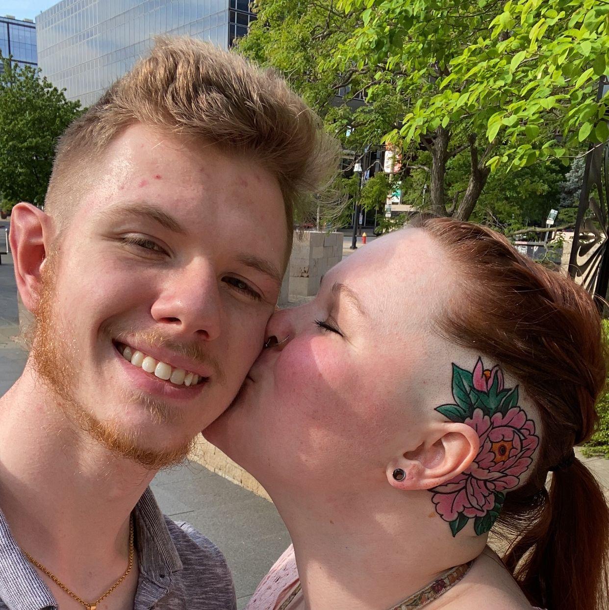 Our St. Louis vacation, John let me get my head tattood. Yes, both sides.