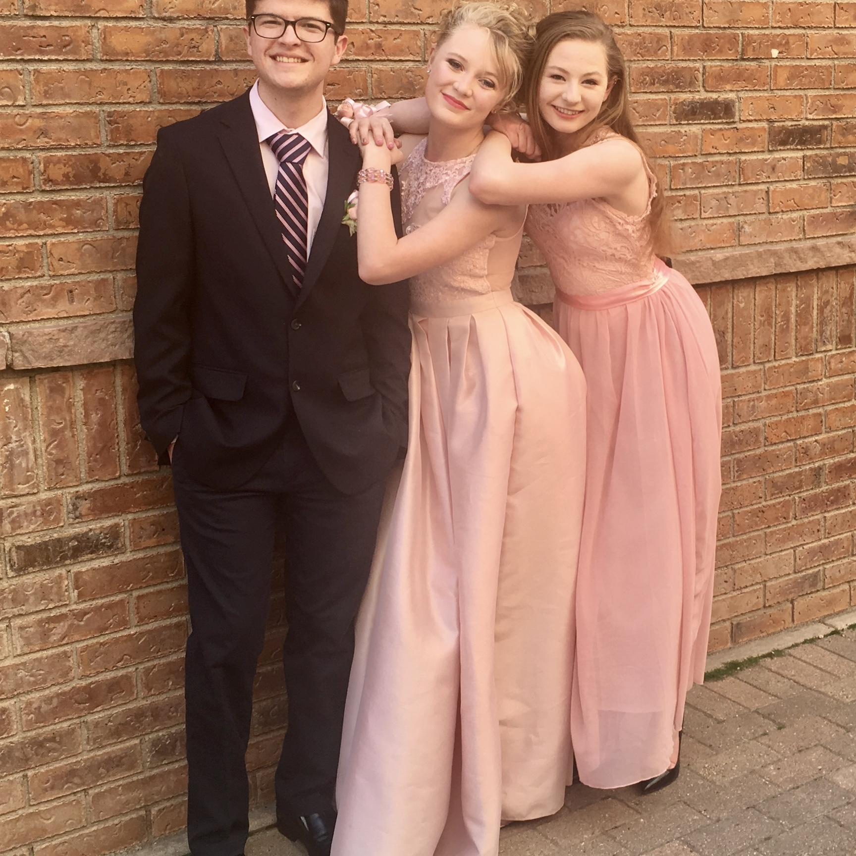Our Junior Prom together. We went as a trio! Felipe, Cassidy and the Maid of Honor Trinity!