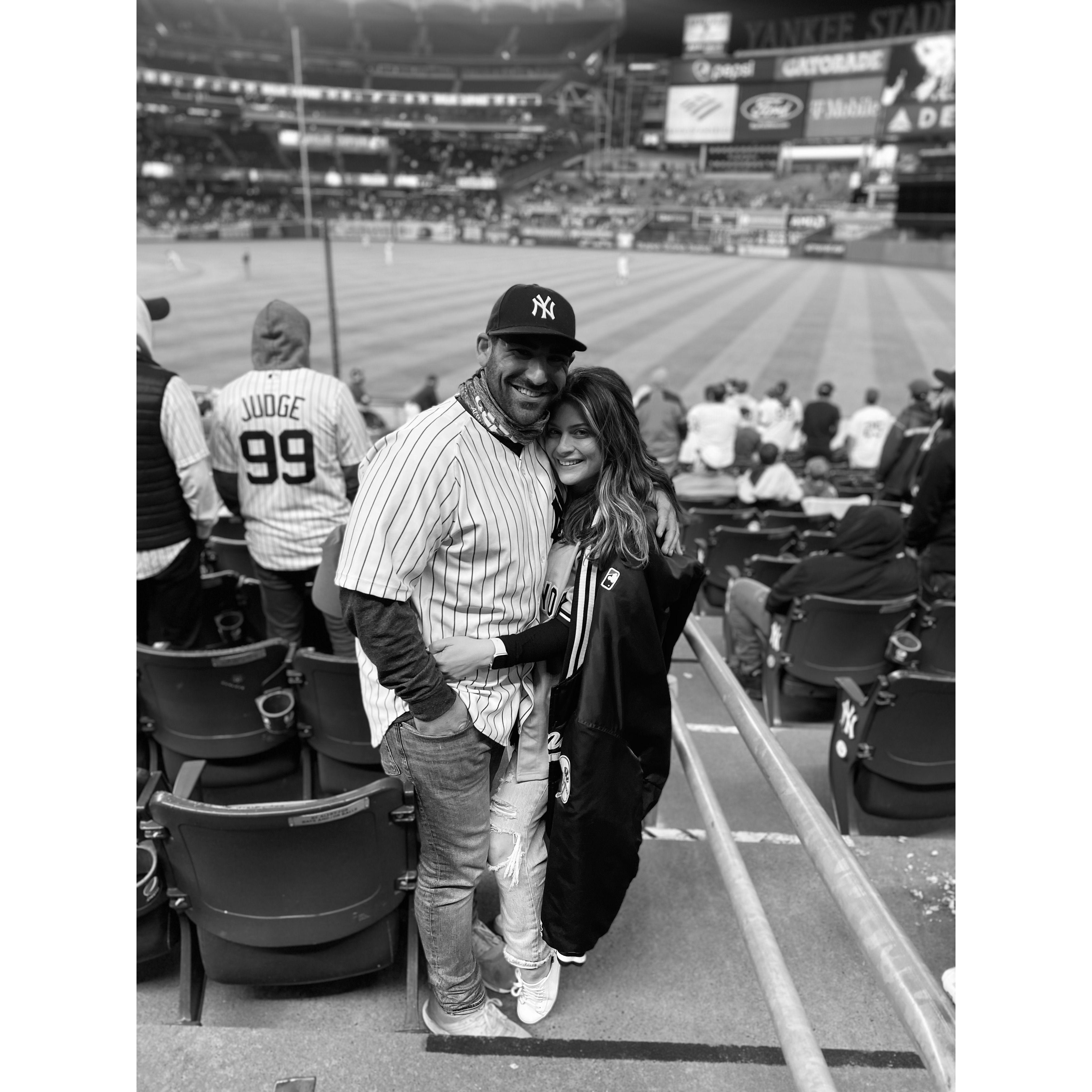 Our first Yankee game (poured the entire time)... many more games followed :/