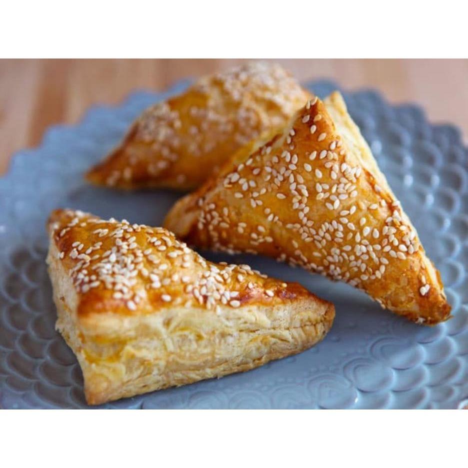 All bourekas are phyllo dough with filling depending on the shape.
Triangle = cheese.
Rectangle = potato.
Spiral = pizza.
Rounded triangle = mushroom.
Half circle = cheese with hard-boiled egg.