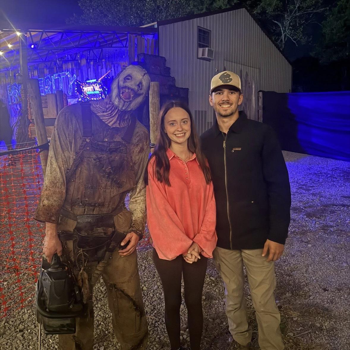 Haunted house!! Serena is TERRIFIED of chainsaws, it took Logan a little convincing to take this picture 😂