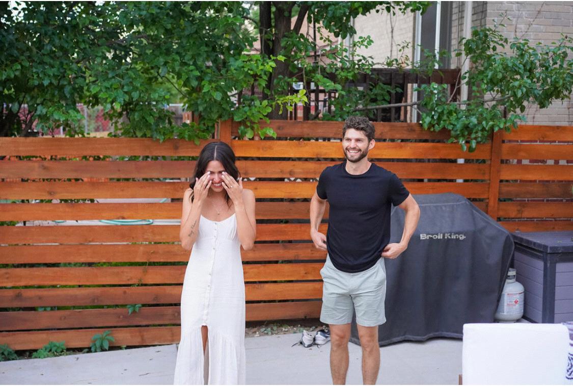 Our entrance into the surprise engagement party with all of our friends.