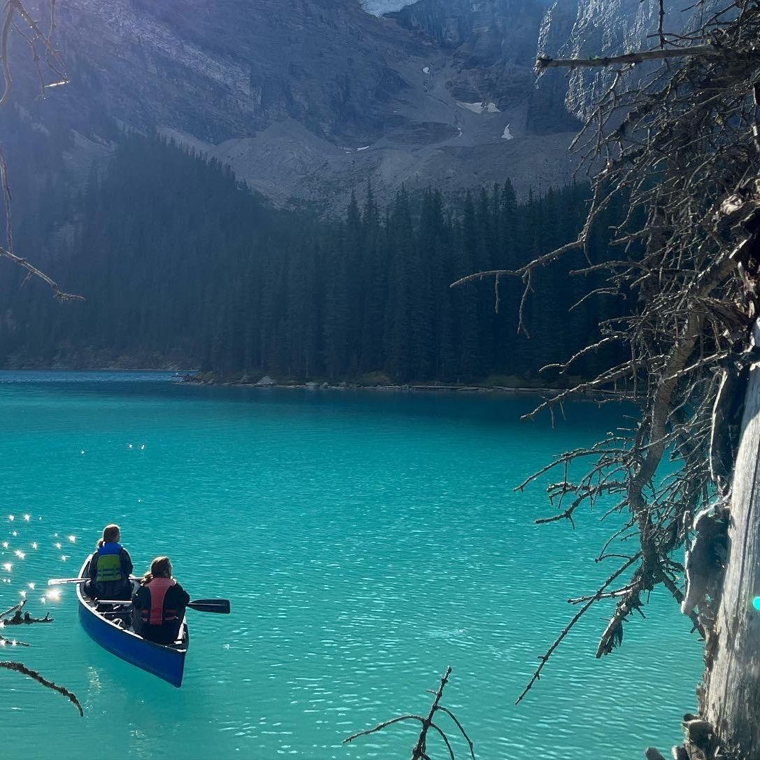 Someone snapped a photo of us canoeing on Moraine Lake in Banff National Park, Canada - this was a bucketlist item!