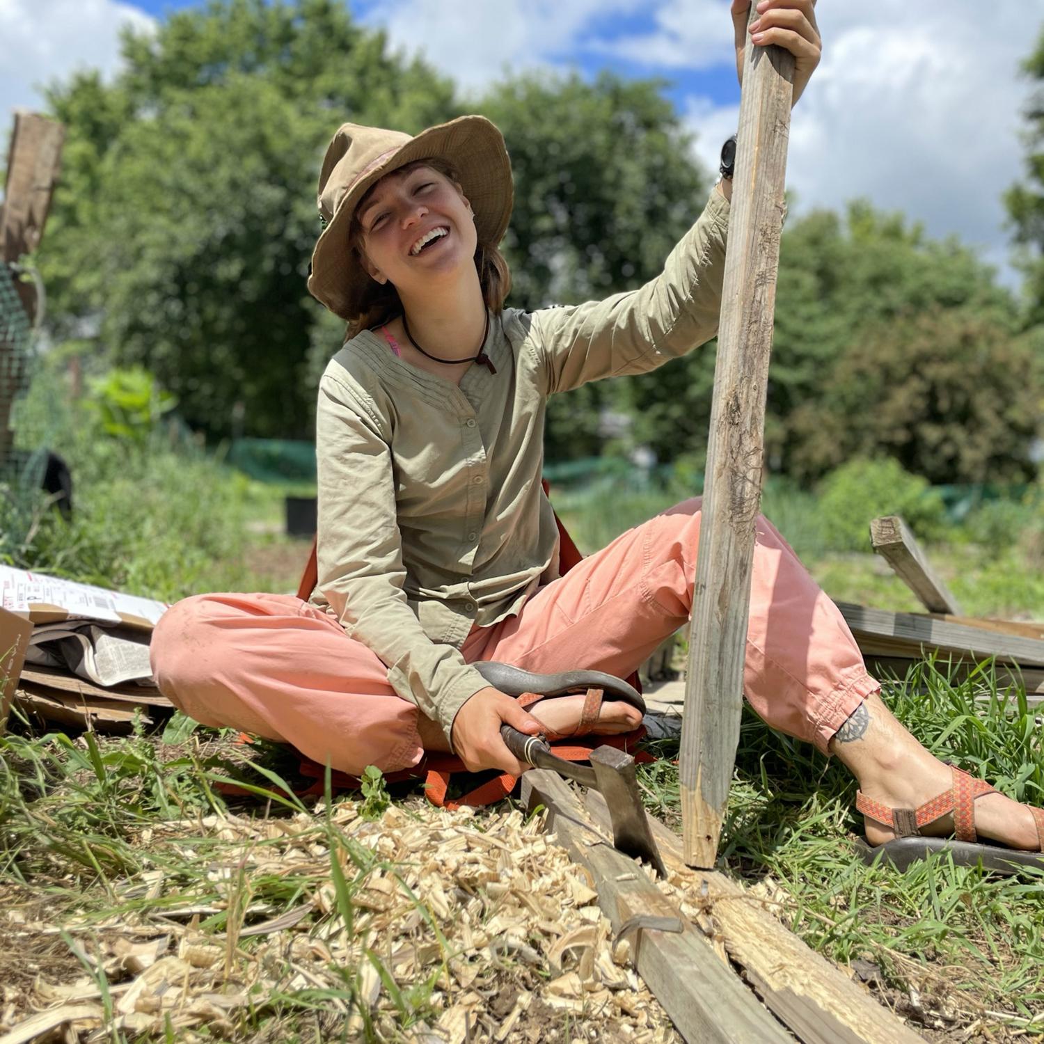 Lucy making some tomato stakes at the farm in Ohio