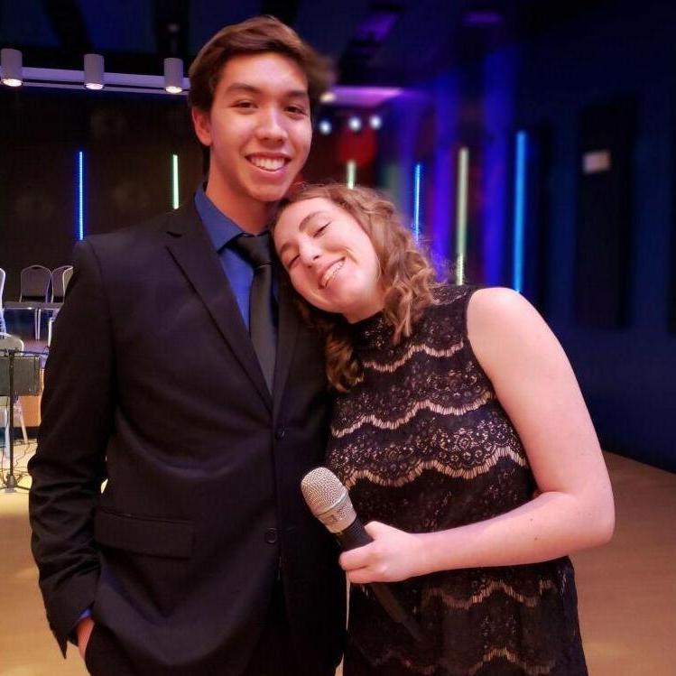 This picture was taken at a jazz concert in 2019 where Nick was playing piano and Shae sang vocals for the group. Fun Fact: This photo has been the screensaver on Shae's phone ever since it was taken!