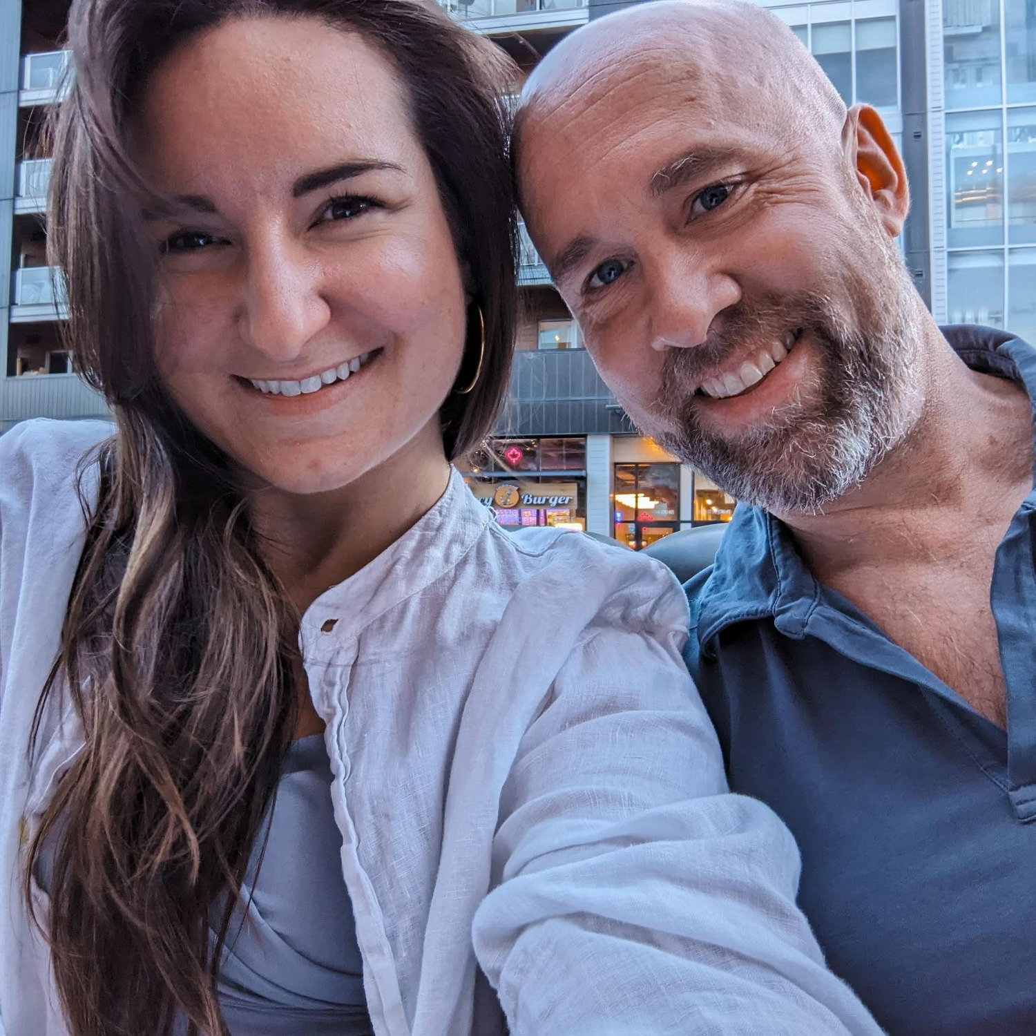 We took this photo right after we signed the papers to move in together