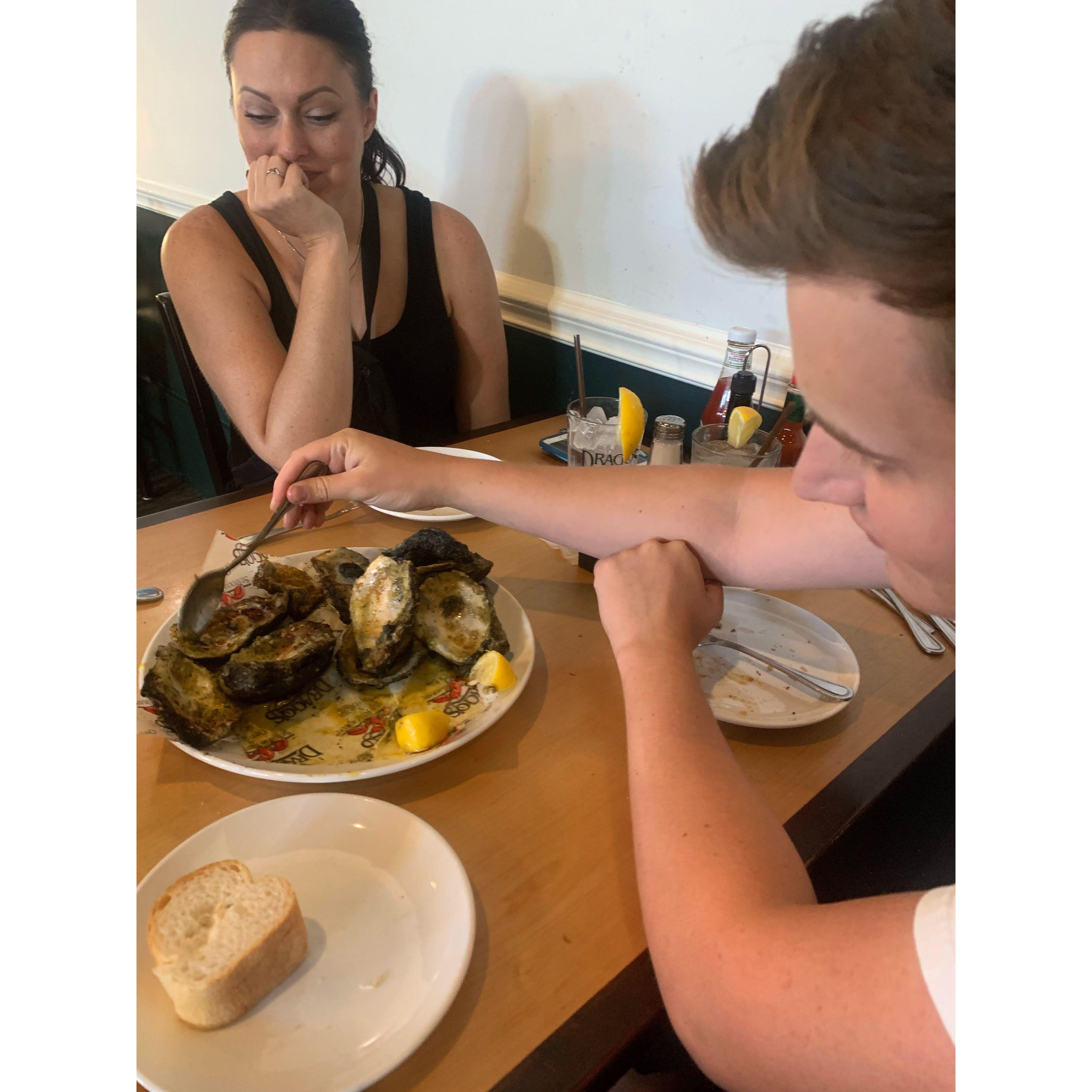 May 26th, 2022. Charbroiled Oysters at Drago's in New Orleans. SO good! Daniel said this was probably his favorite food there, but that answer tends to change... Watch out, Cass is eyeing those!