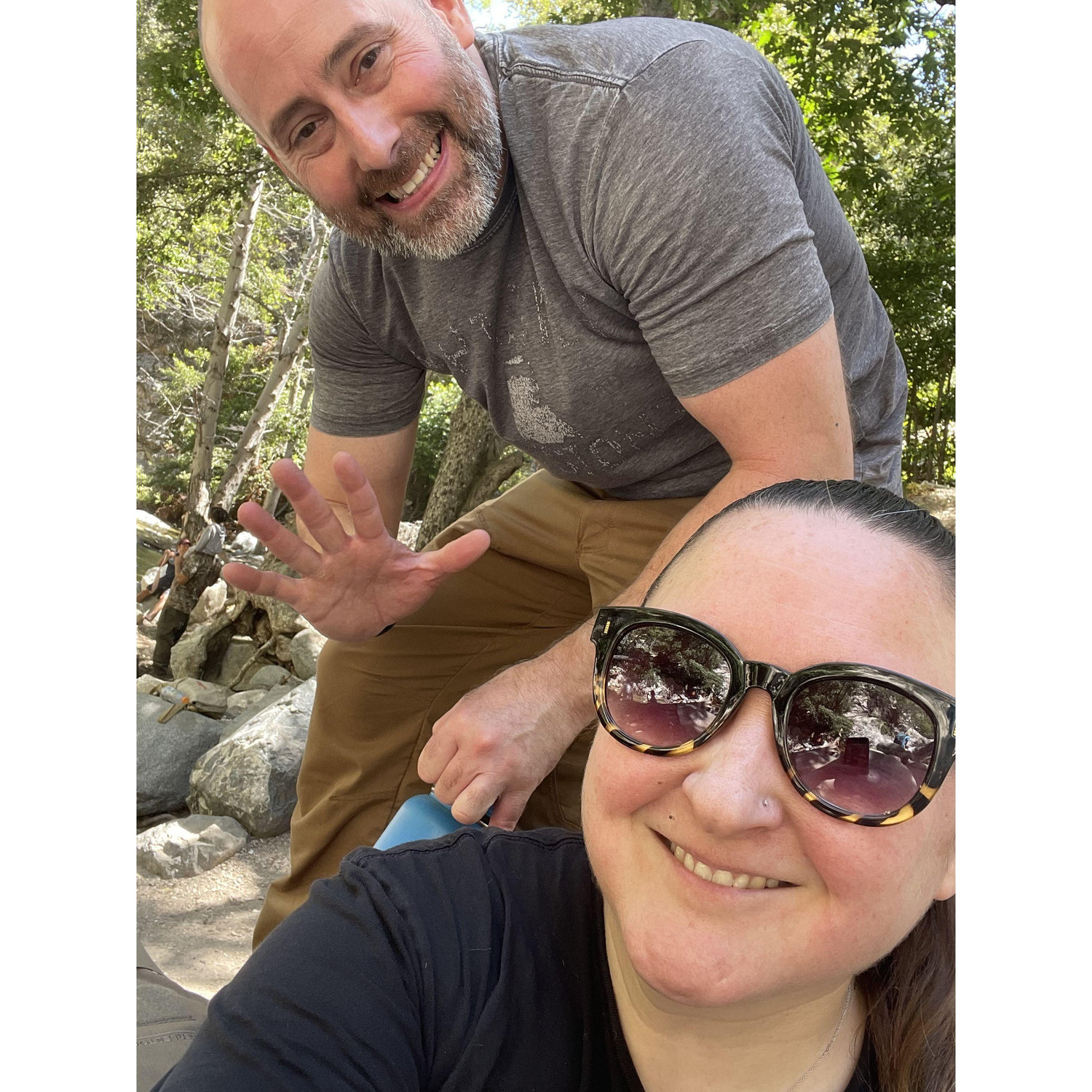 Made it to the end of the trail, hanging out at the waterfall before heading back. One of our favorite things to do together is go hiking with friends.