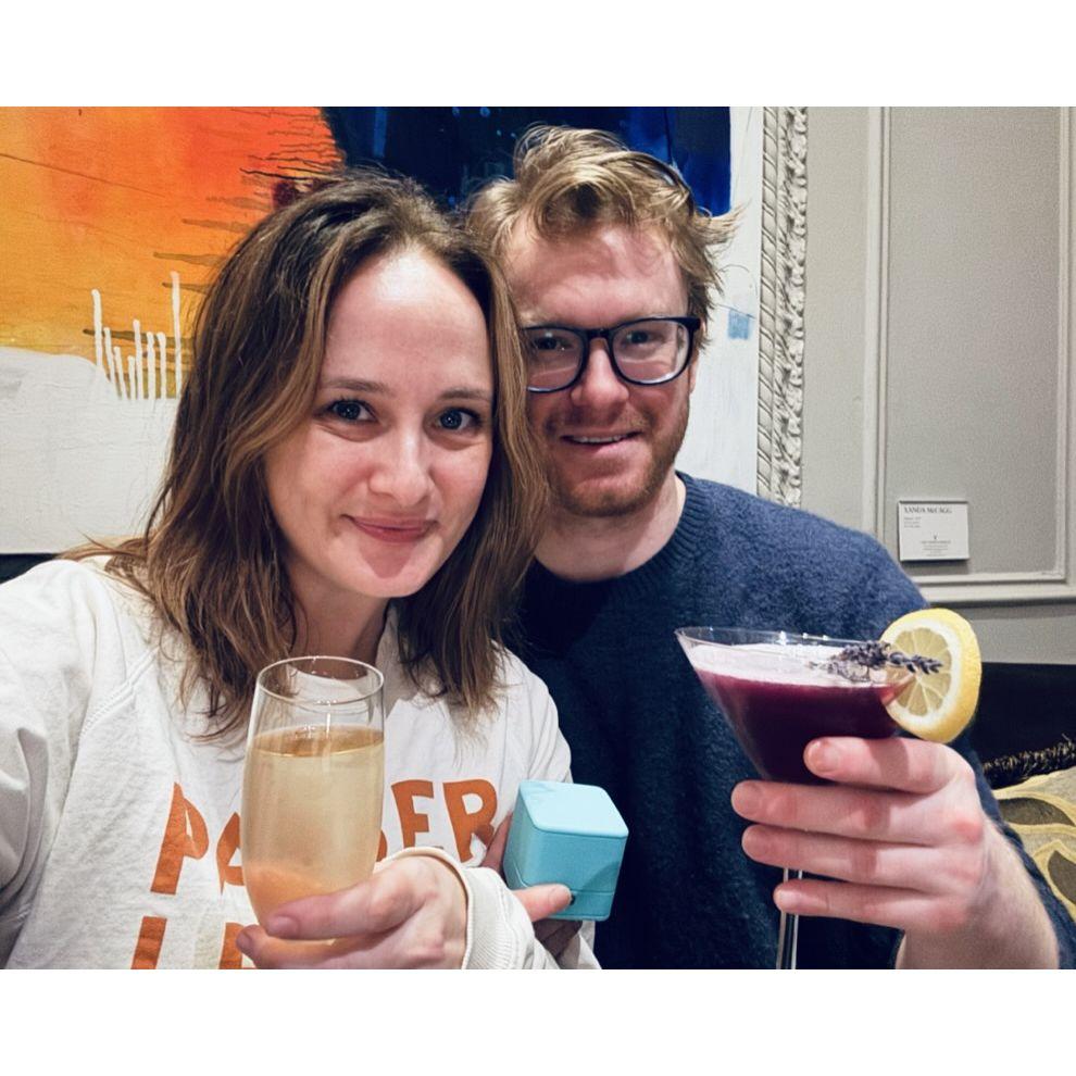 Toasting the purchase of our wedding rings