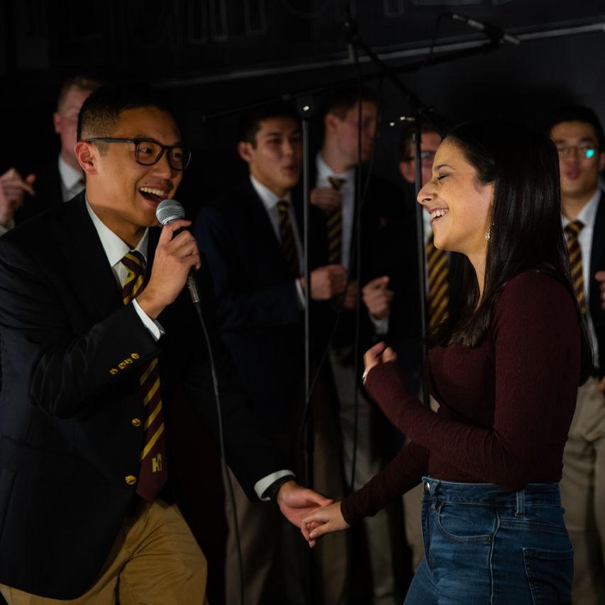 Greg serenading Katherine at the Heightsmen fall cafe, 2018