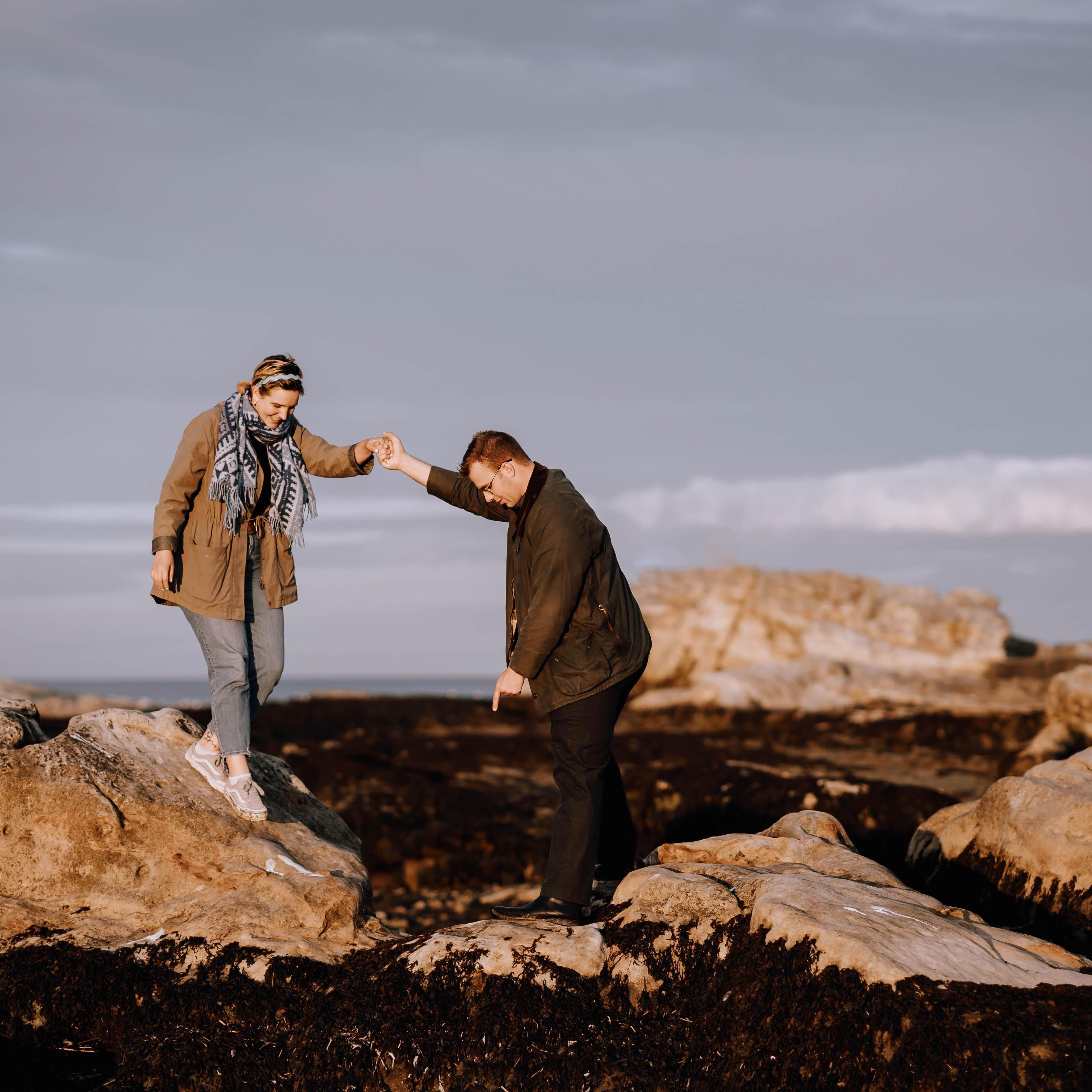 It's not enough to hold someone's hand for stability, you must also point out where the step is so they don't miss it and fall on their face. Especially in front of cameras.