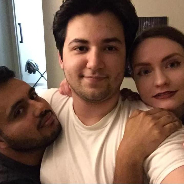 Robert and Sarah pose with visiting friend Aziz, March 2019.