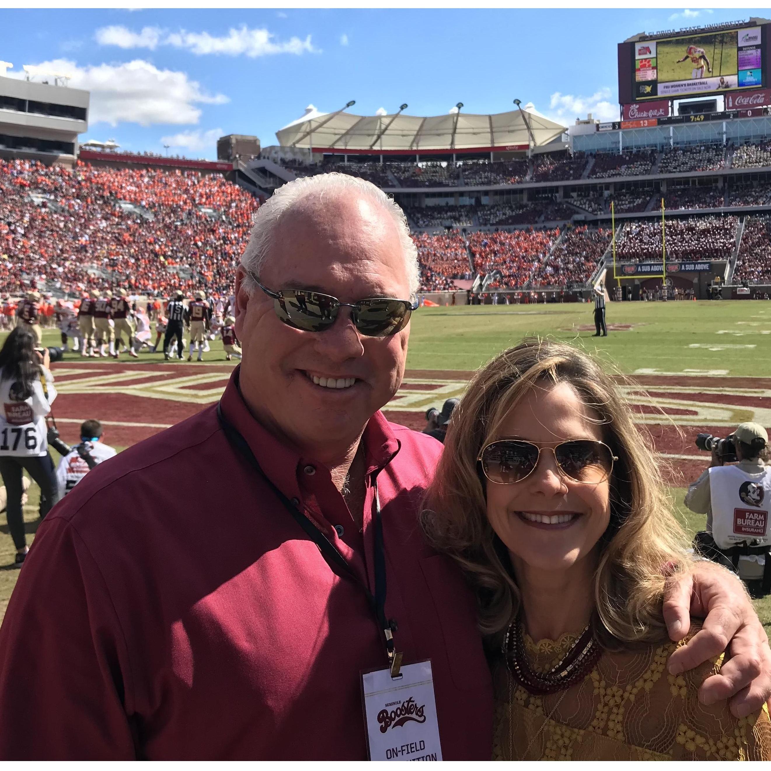 One of our many Florida State football games! I never told him no again to a game.