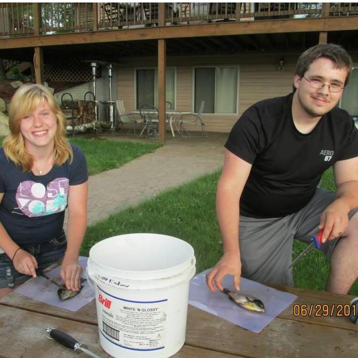 Cleaning our fish we caught on Bass Lake in 2012