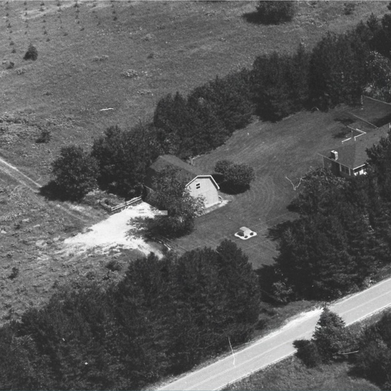 An aerial shot of the house and car barn in 1993. The pine trees were young, the vineyard was still active, and the horse barn was nowhere to be seen.