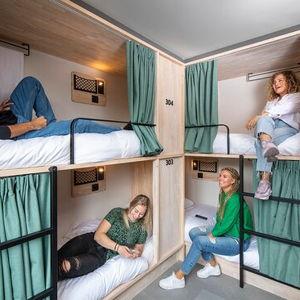 Make Haly stay in a hostel for the first time