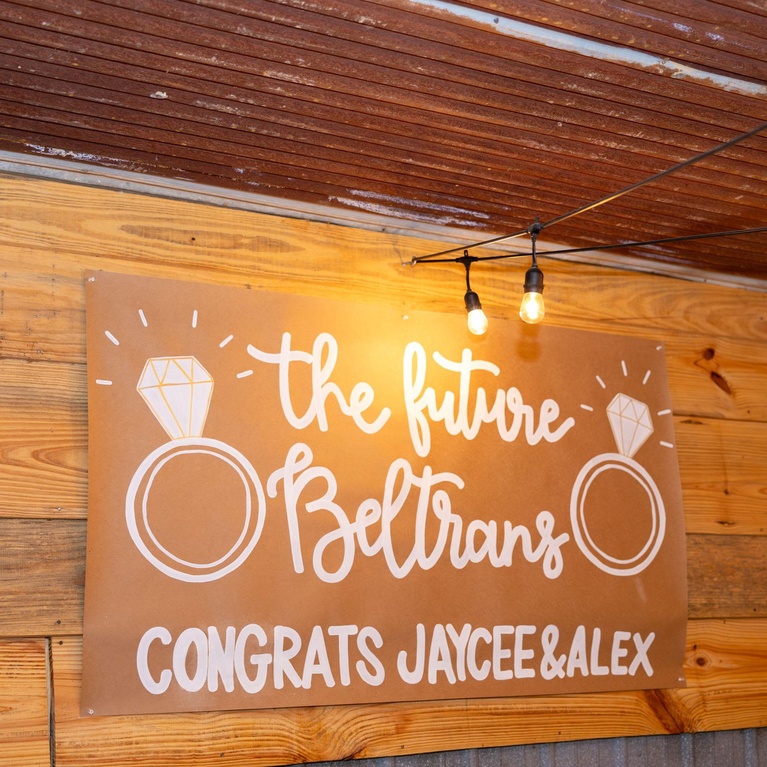 Beautiful engagement sign that the brides sweet Aunt Carlee painted.