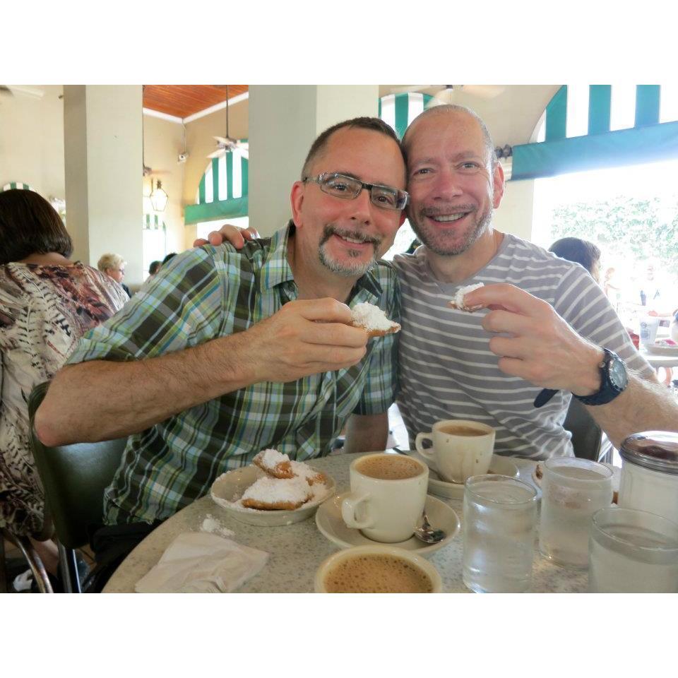 Ed introducing Barry to beignets at Café du Monde, New Orleans, LA