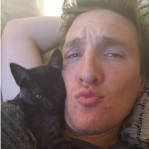 Odin and David cuddling
