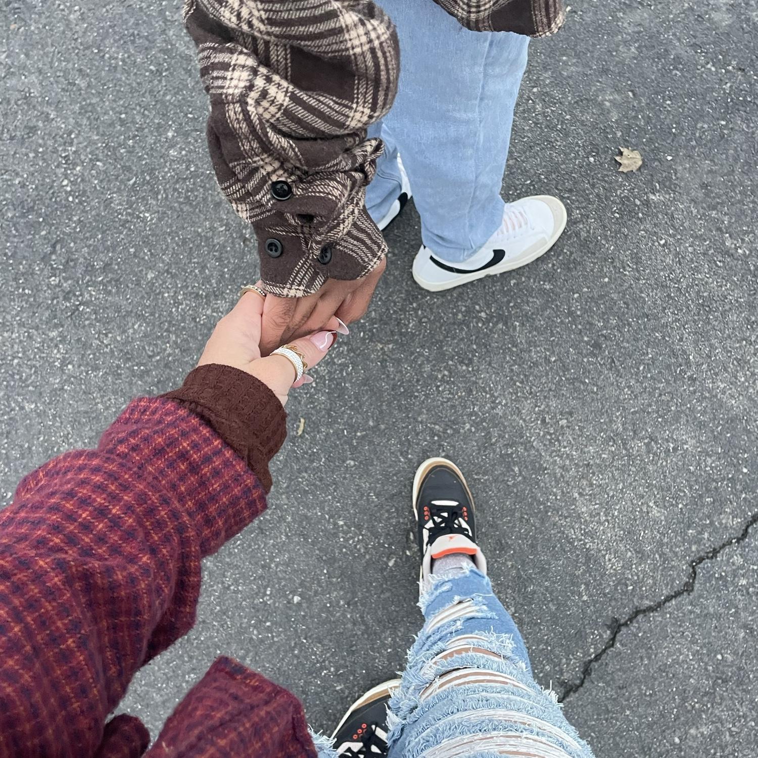 Always holding his hand