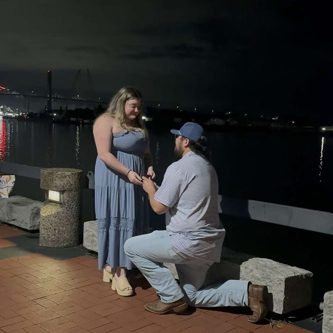 He proposed on River Street in Savannah, GA.