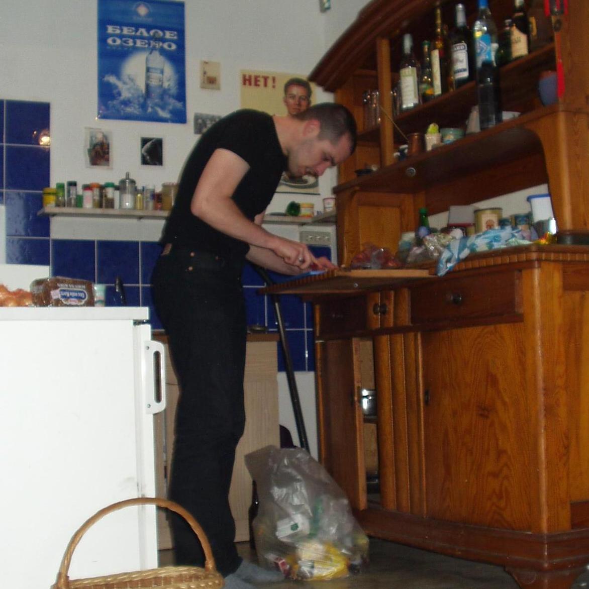 Alex cooking for Rachel in Cottbus, 2004.