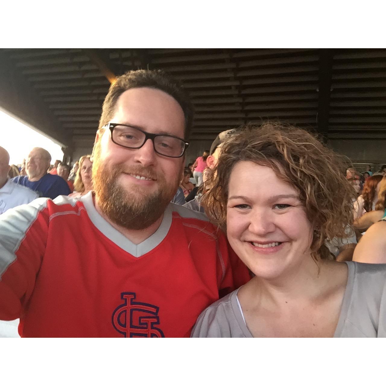 We might go to the fair a bit much! This is us waiting to see a show at the Mississippi Valley Fair