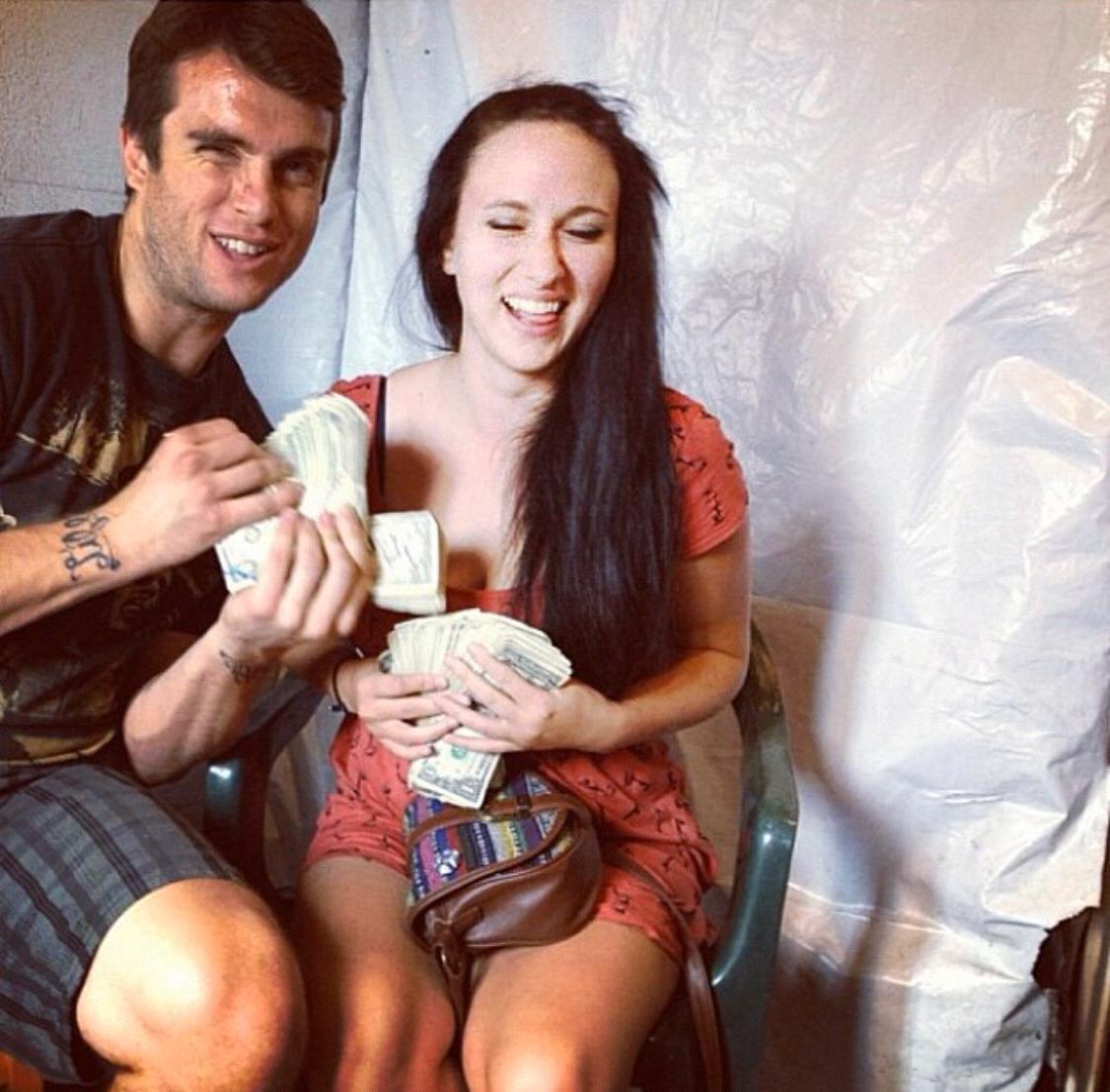 Back before we were dating we would pose with scandalous stripper money for fun.