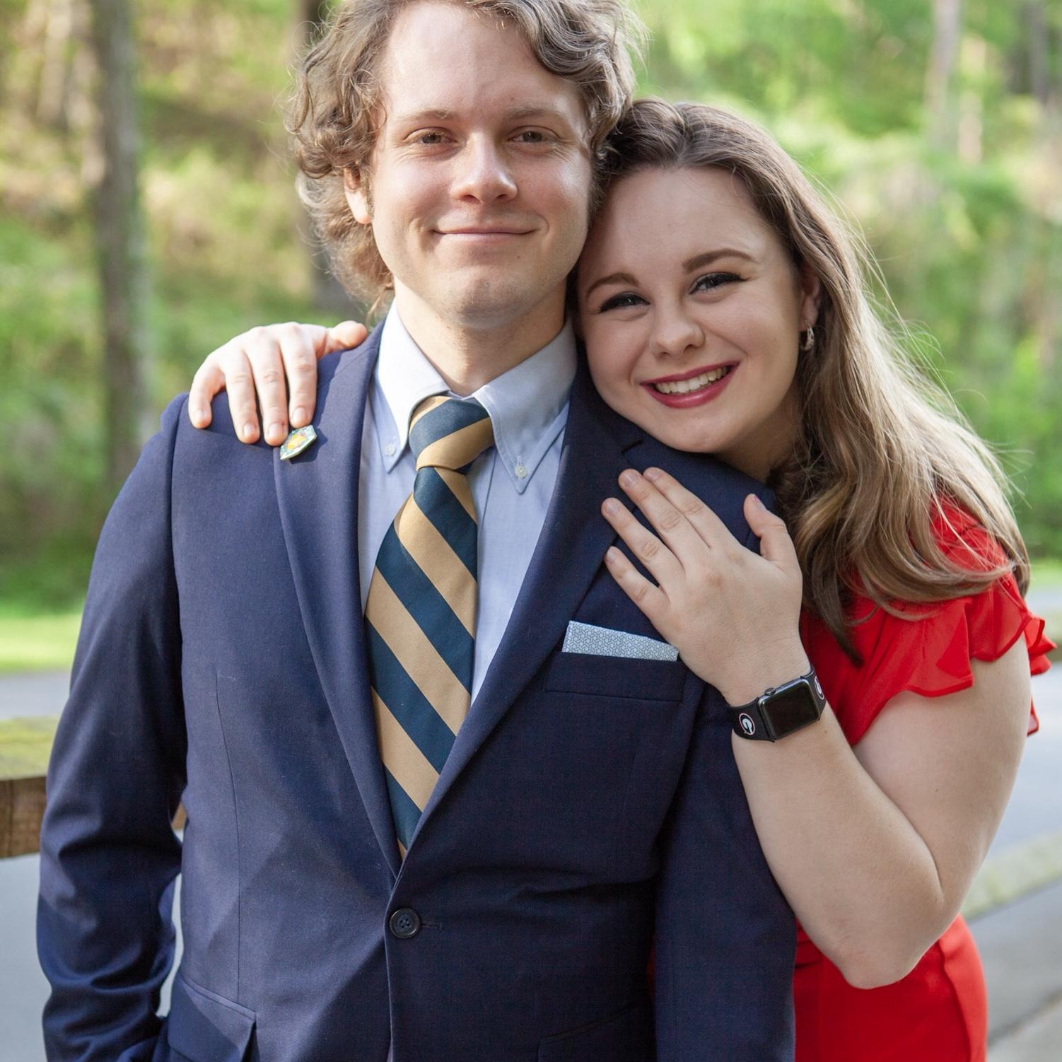 College graduation photos! We're wearing our respective school colors.
