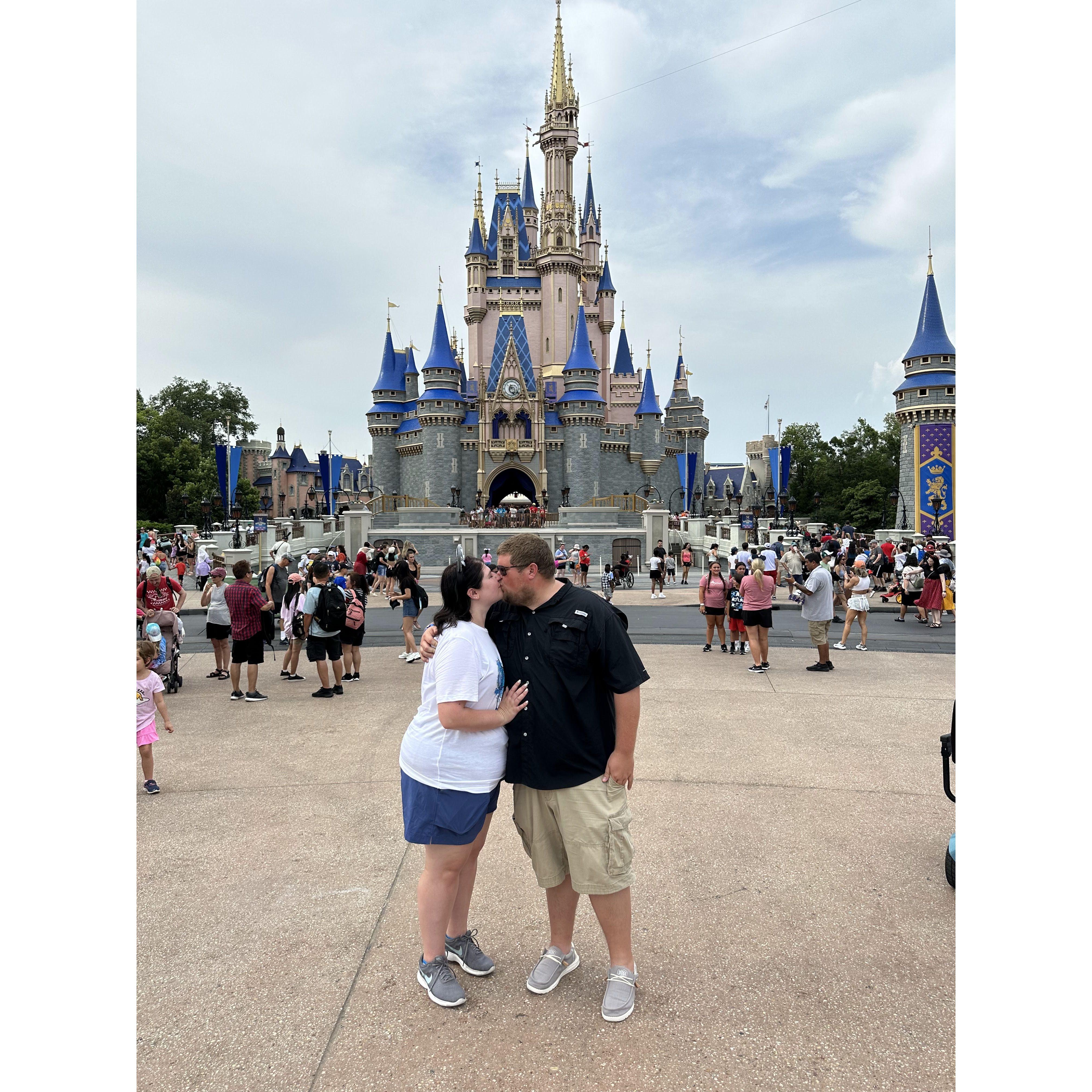 Disney World Trip and a classic kiss in front of Cinderella's castle
