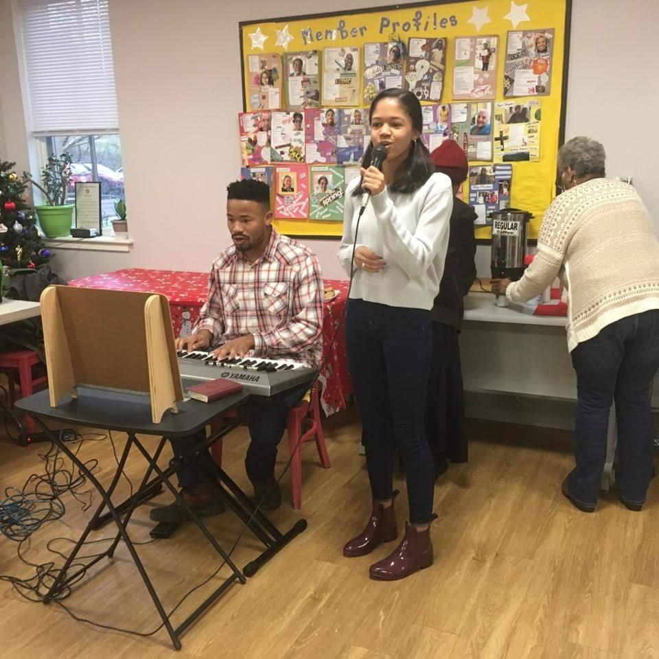 Kelly and Joshua singing hymns at the Jaba Senior Center.