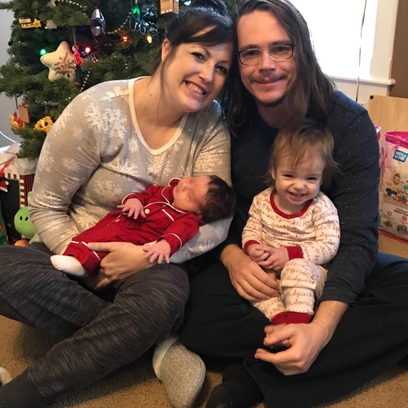 Our first photo as a complete family! Christmas 2022.