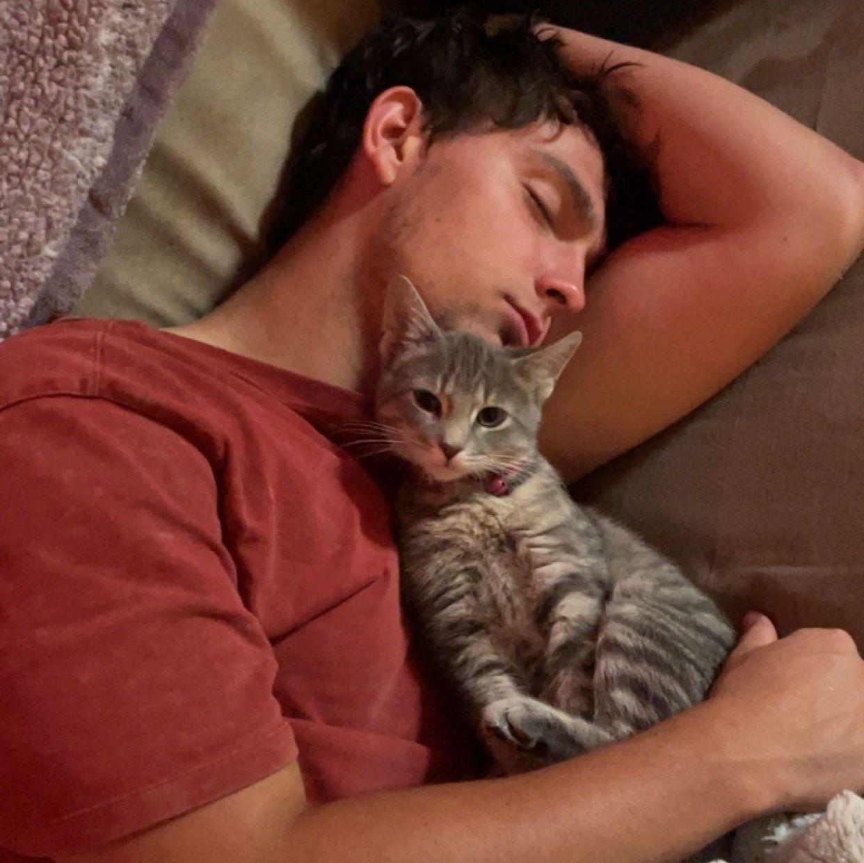 I adopted our first cat Luna and he swore he didn't want a cat...