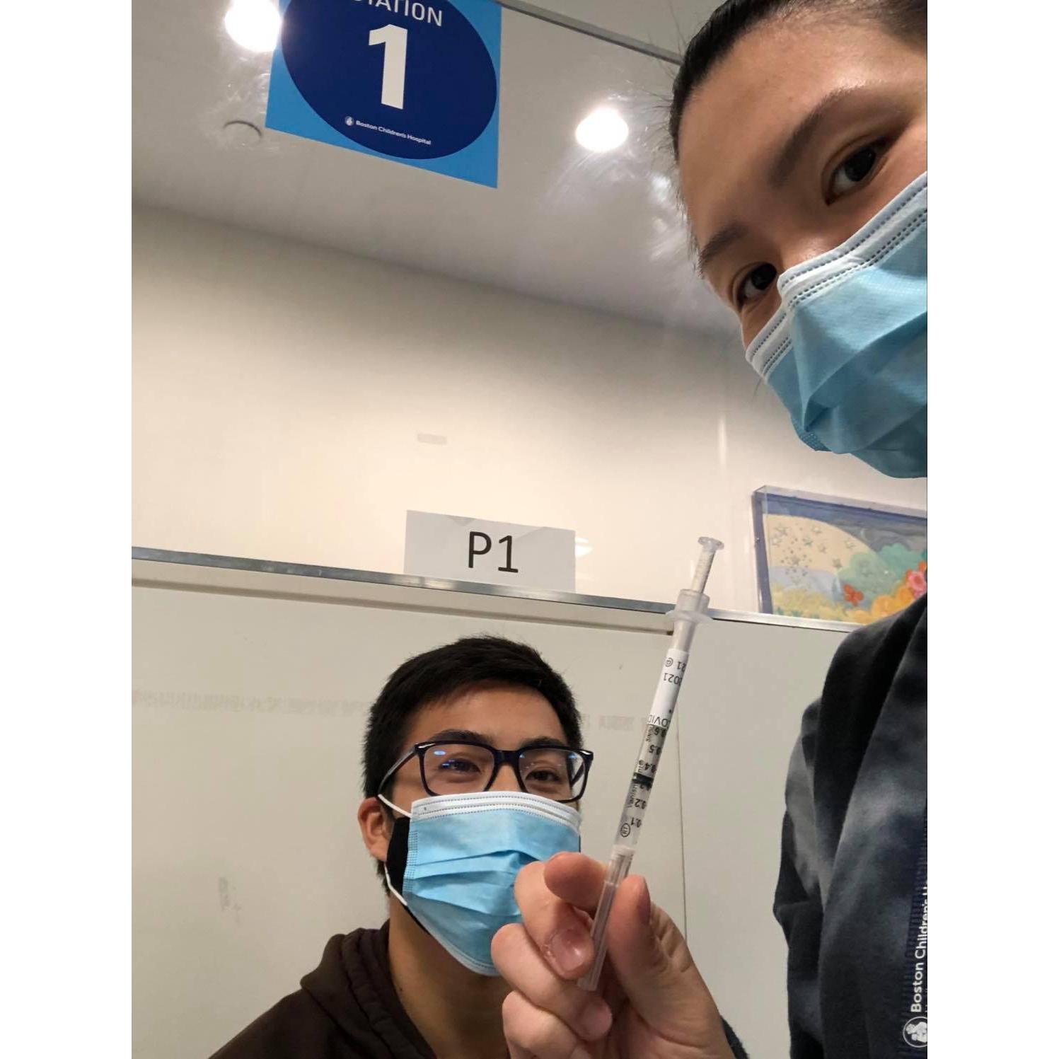 Akie personally giving Jeremiah his covid-19 vaccine!